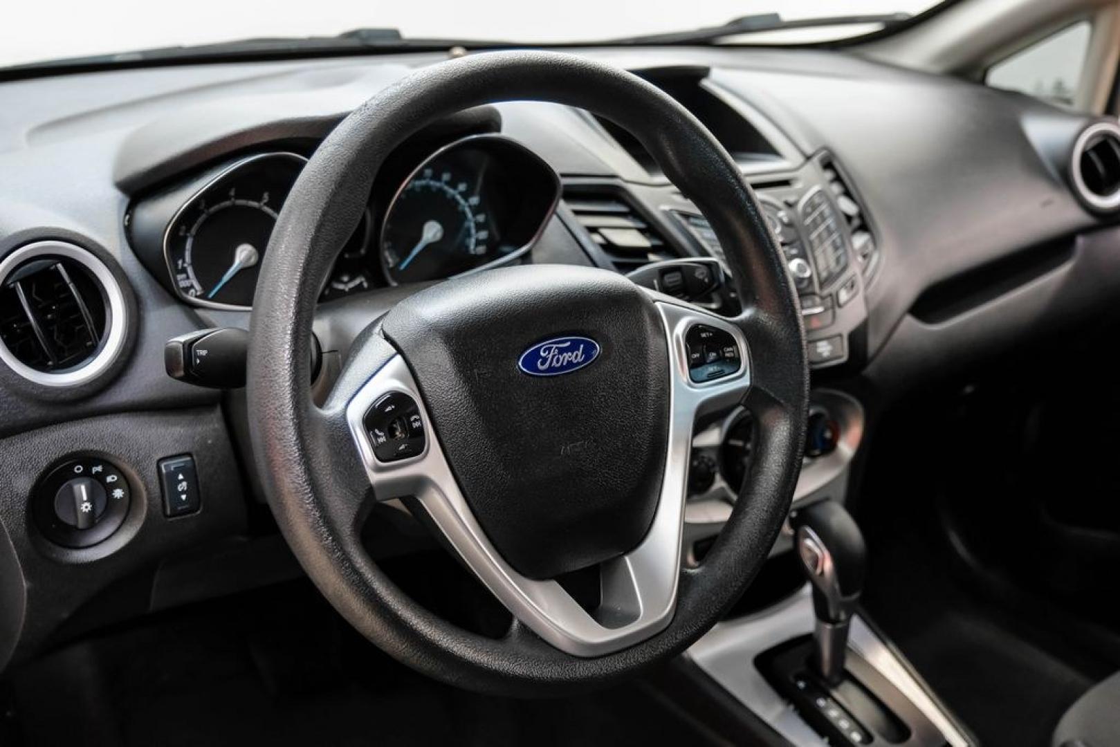 2019 Oxford White /Black Ford Fiesta SE (3FADP4EJXKM) with an 1.6L I4 Ti-VCT engine, Automatic transmission, located at 15300 Midway Rd., Addison, TX, 75001, (972) 702-0011, 32.958321, -96.838074 - Photo#14