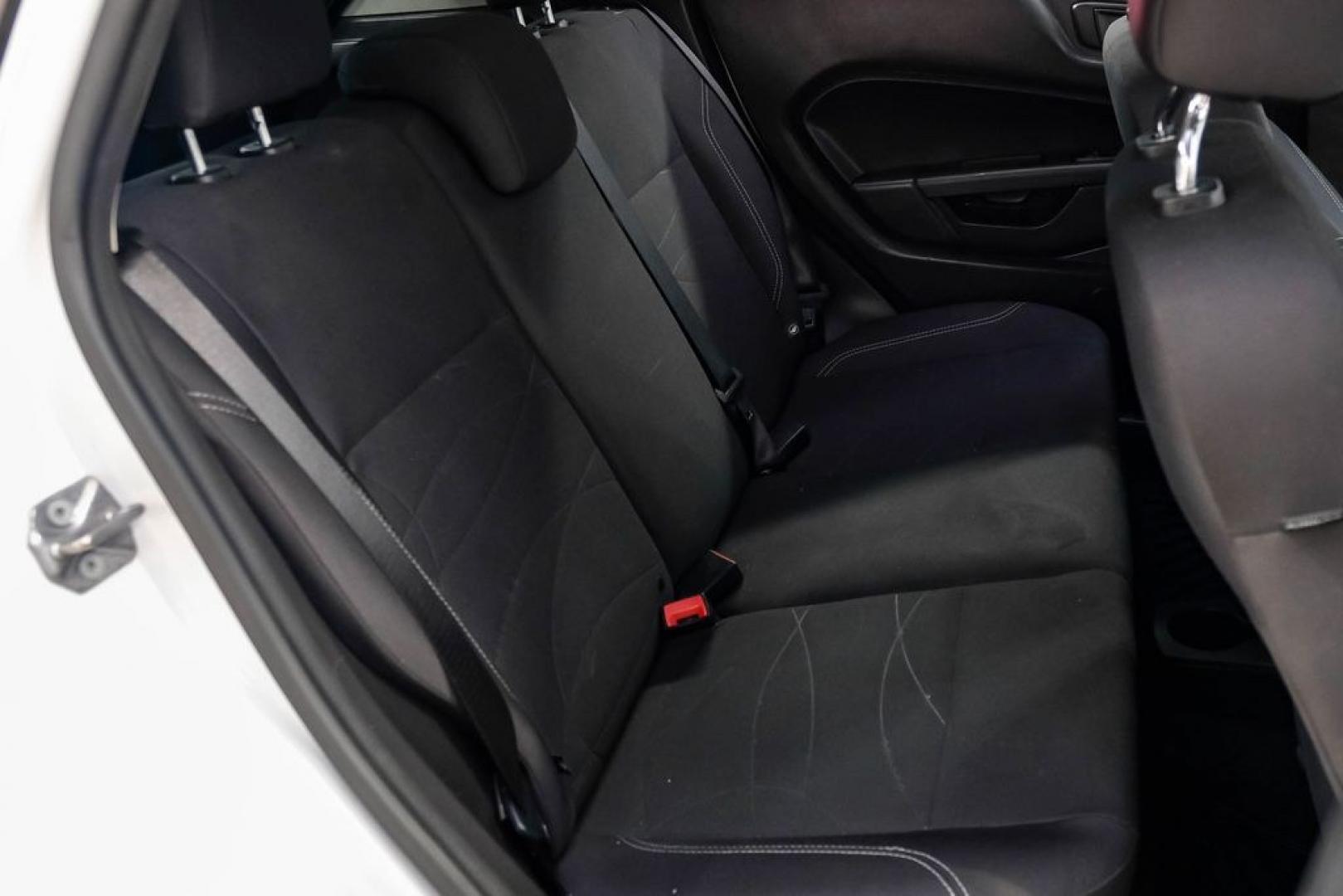 2019 Oxford White /Black Ford Fiesta SE (3FADP4EJXKM) with an 1.6L I4 Ti-VCT engine, Automatic transmission, located at 15300 Midway Rd., Addison, TX, 75001, (972) 702-0011, 32.958321, -96.838074 - Photo#33