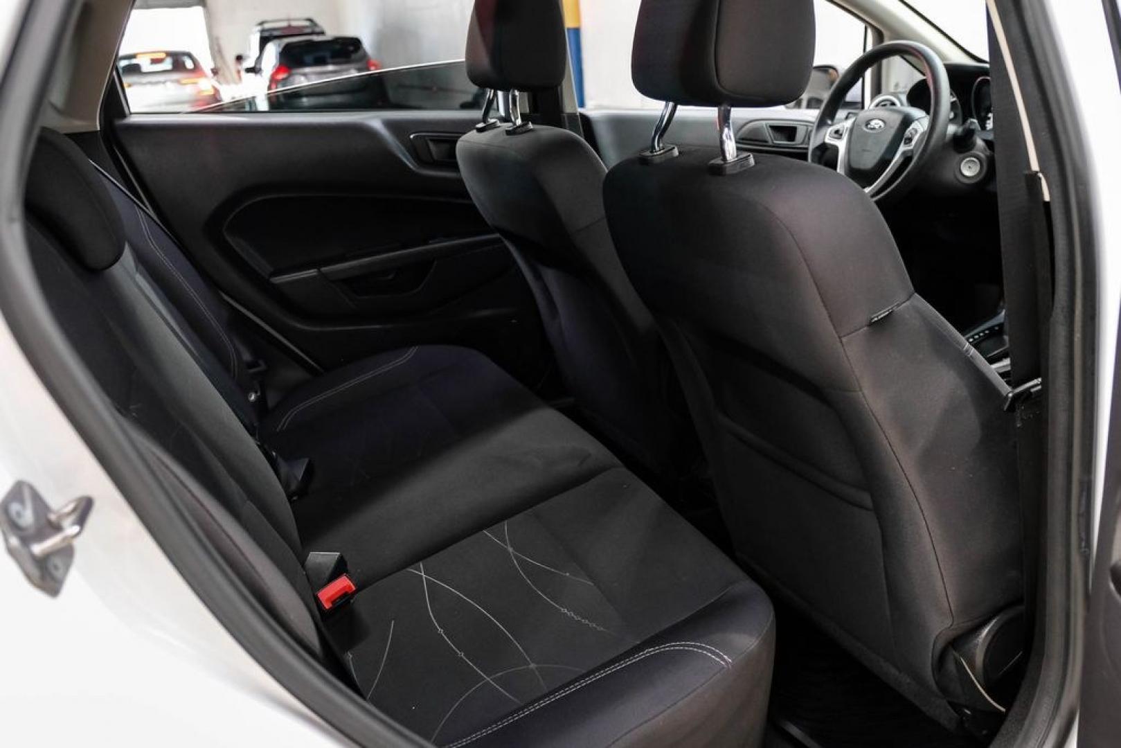 2019 Oxford White /Black Ford Fiesta SE (3FADP4EJXKM) with an 1.6L I4 Ti-VCT engine, Automatic transmission, located at 15300 Midway Rd., Addison, TX, 75001, (972) 702-0011, 32.958321, -96.838074 - Photo#34