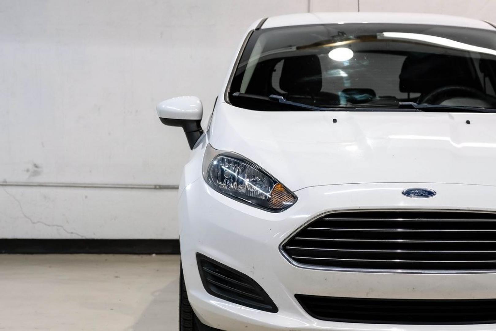 2019 Oxford White /Black Ford Fiesta SE (3FADP4EJXKM) with an 1.6L I4 Ti-VCT engine, Automatic transmission, located at 15300 Midway Rd., Addison, TX, 75001, (972) 702-0011, 32.958321, -96.838074 - Photo#43