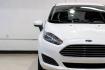 2019 Oxford White /Black Ford Fiesta SE (3FADP4EJXKM) with an 1.6L I4 Ti-VCT engine, Automatic transmission, located at 15300 Midway Rd., Addison, TX, 75001, (972) 702-0011, 32.958321, -96.838074 - Photo#43