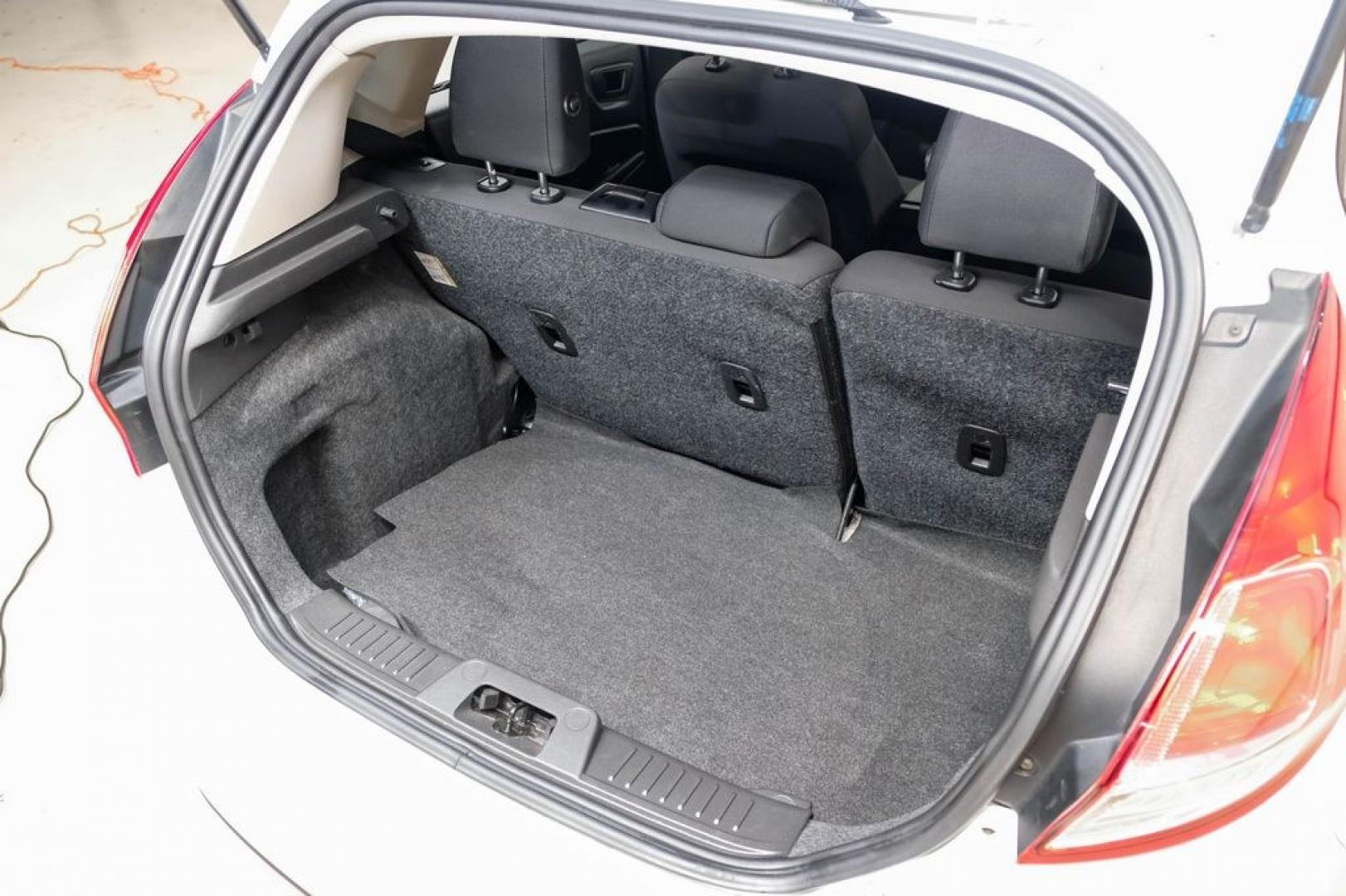 2019 Oxford White /Black Ford Fiesta SE (3FADP4EJXKM) with an 1.6L I4 Ti-VCT engine, Automatic transmission, located at 15300 Midway Rd., Addison, TX, 75001, (972) 702-0011, 32.958321, -96.838074 - Photo#48