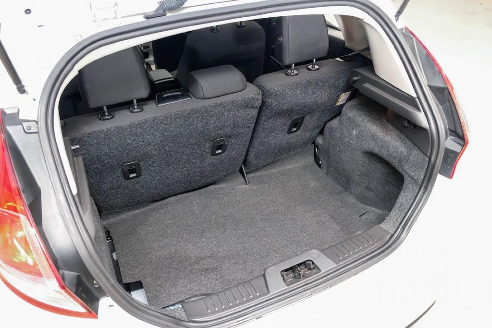 2019 Oxford White /Black Ford Fiesta SE (3FADP4EJXKM) with an 1.6L I4 Ti-VCT engine, Automatic transmission, located at 15300 Midway Rd., Addison, TX, 75001, (972) 702-0011, 32.958321, -96.838074 - Photo#49