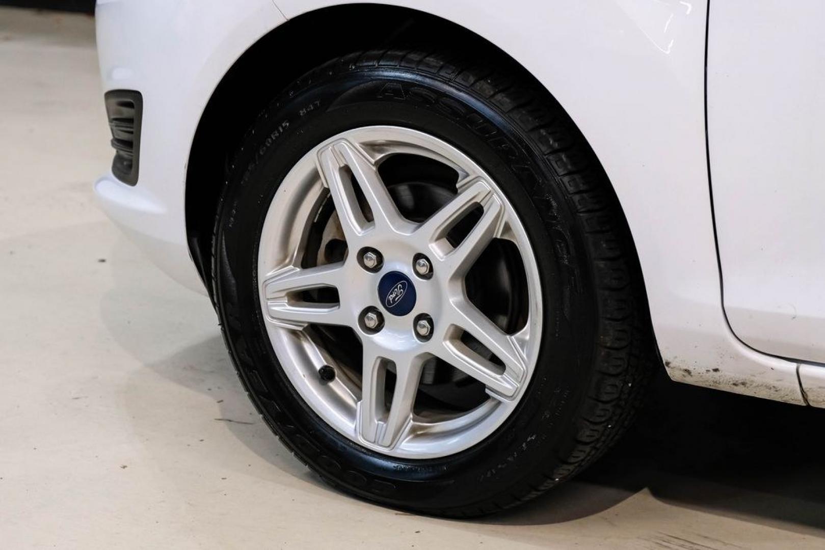 2019 Oxford White /Black Ford Fiesta SE (3FADP4EJXKM) with an 1.6L I4 Ti-VCT engine, Automatic transmission, located at 15300 Midway Rd., Addison, TX, 75001, (972) 702-0011, 32.958321, -96.838074 - Photo#52