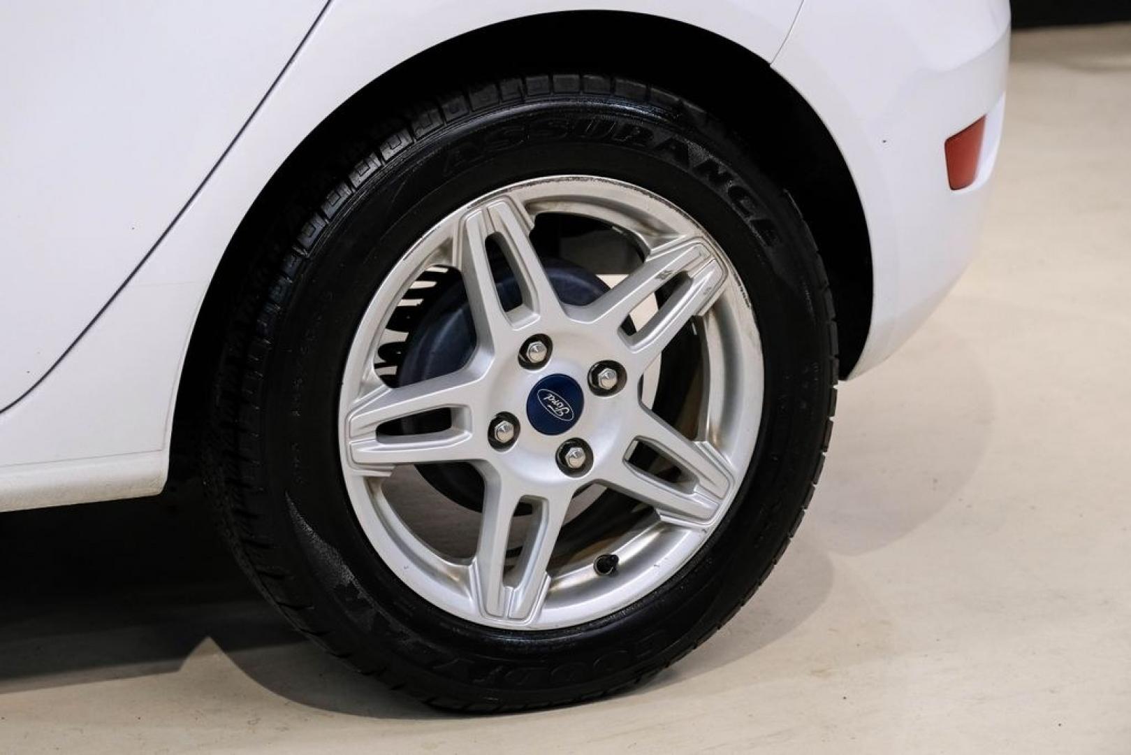 2019 Oxford White /Black Ford Fiesta SE (3FADP4EJXKM) with an 1.6L I4 Ti-VCT engine, Automatic transmission, located at 15300 Midway Rd., Addison, TX, 75001, (972) 702-0011, 32.958321, -96.838074 - Photo#53