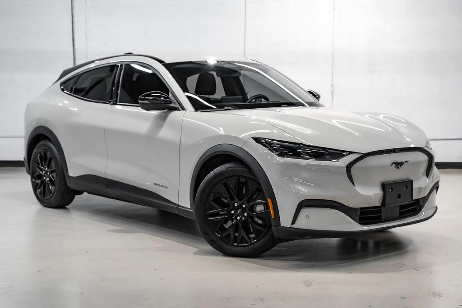 2025 Desert Sand /Black Onyx Ford Mustang Mach-E Select (3FMTK1R46SM) with an Electric Motor engine, Automatic transmission, located at 15300 Midway Rd., Addison, TX, 75001, (972) 702-0011, 32.958321, -96.838074 - Photo#5