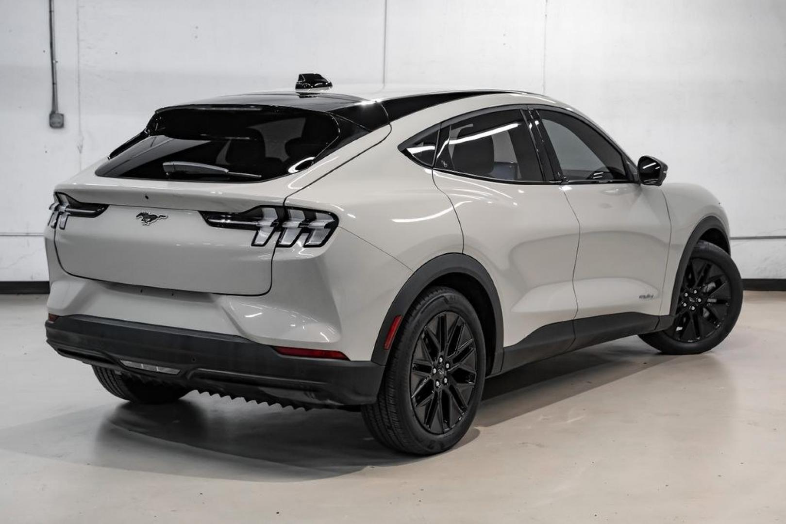 2025 Desert Sand /Black Onyx Ford Mustang Mach-E Select (3FMTK1R46SM) with an Electric Motor engine, Automatic transmission, located at 15300 Midway Rd., Addison, TX, 75001, (972) 702-0011, 32.958321, -96.838074 - Photo#7