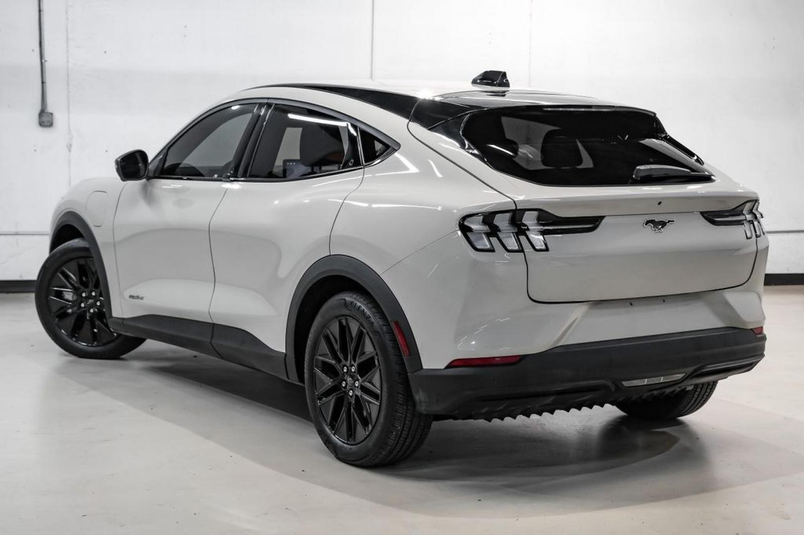 2025 Desert Sand /Black Onyx Ford Mustang Mach-E Select (3FMTK1R46SM) with an Electric Motor engine, Automatic transmission, located at 15300 Midway Rd., Addison, TX, 75001, (972) 702-0011, 32.958321, -96.838074 - Photo#9