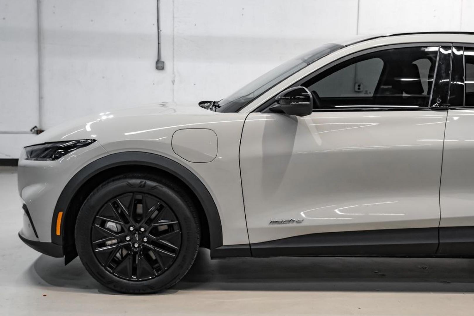 2025 Desert Sand /Black Onyx Ford Mustang Mach-E Select (3FMTK1R46SM) with an Electric Motor engine, Automatic transmission, located at 15300 Midway Rd., Addison, TX, 75001, (972) 702-0011, 32.958321, -96.838074 - Photo#11