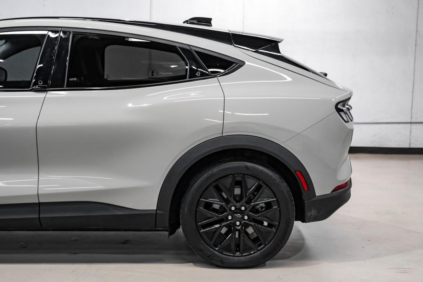 2025 Desert Sand /Black Onyx Ford Mustang Mach-E Select (3FMTK1R46SM) with an Electric Motor engine, Automatic transmission, located at 15300 Midway Rd., Addison, TX, 75001, (972) 702-0011, 32.958321, -96.838074 - Photo#12