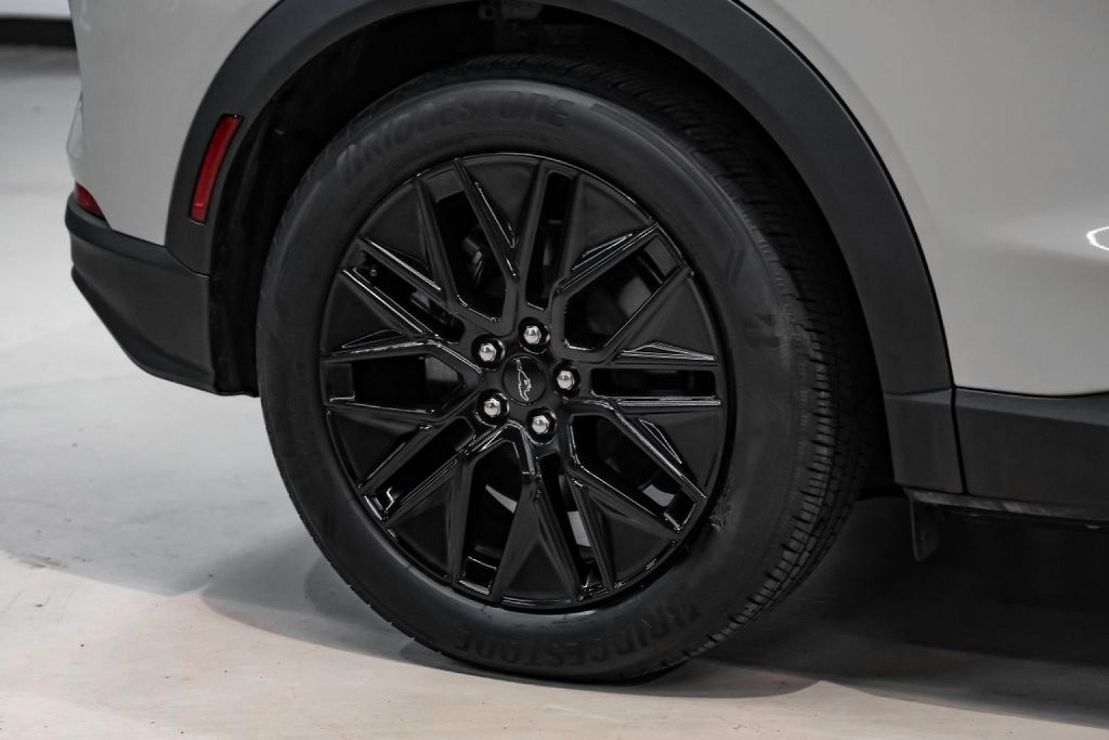 2025 Desert Sand /Black Onyx Ford Mustang Mach-E Select (3FMTK1R46SM) with an Electric Motor engine, Automatic transmission, located at 15300 Midway Rd., Addison, TX, 75001, (972) 702-0011, 32.958321, -96.838074 - Photo#54