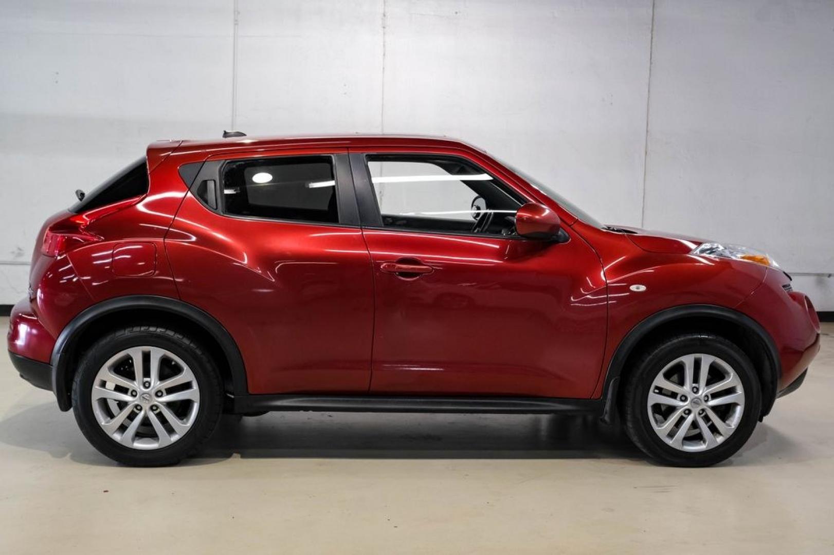 2012 Cayenne Red /Black/Red Nissan Juke SV (JN8AF5MV2CT) with an 1.6L I4 DOHC 16V engine, CVT transmission, located at 15300 Midway Rd., Addison, TX, 75001, (972) 702-0011, 32.958321, -96.838074 - Photo#7