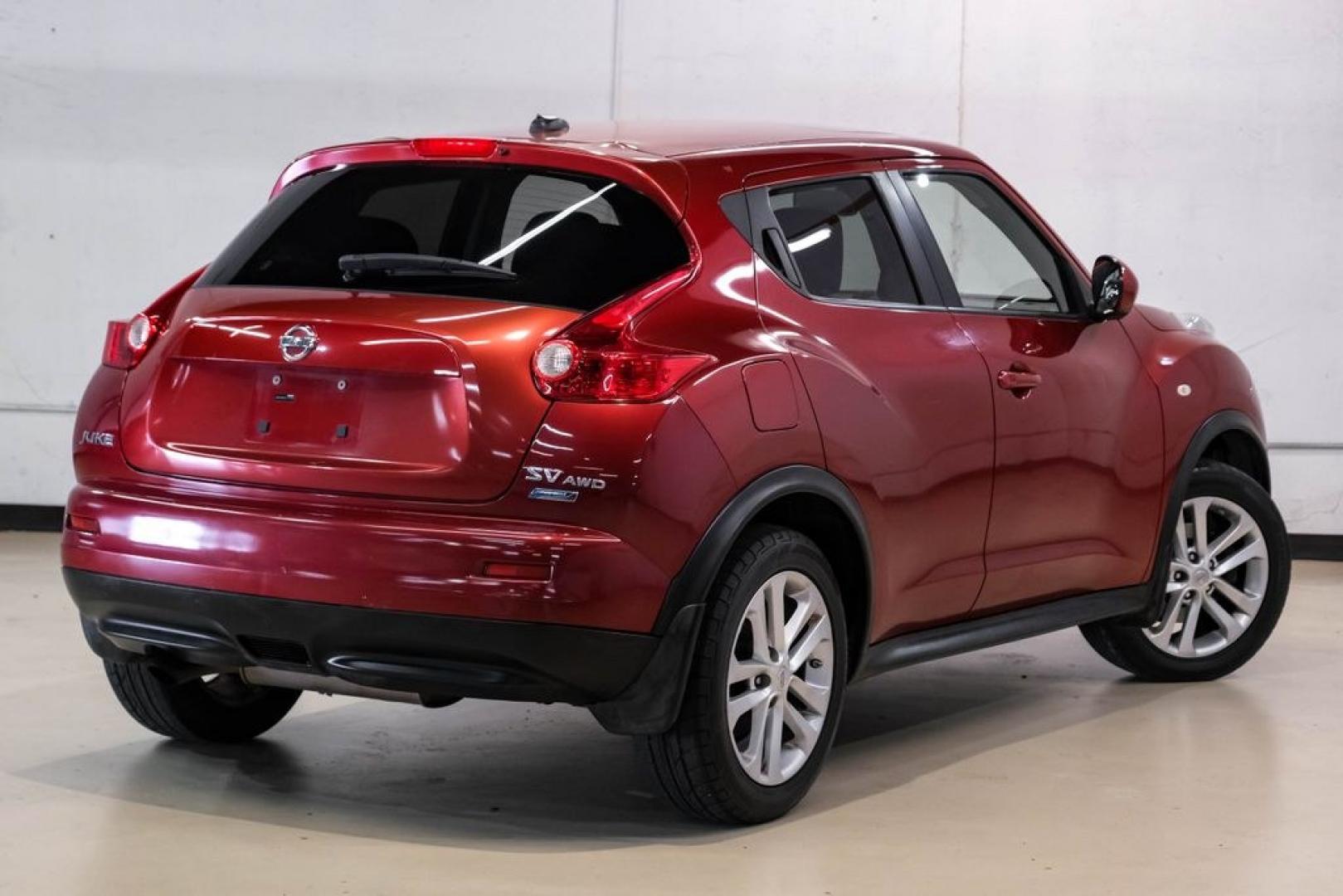 2012 Cayenne Red /Black/Red Nissan Juke SV (JN8AF5MV2CT) with an 1.6L I4 DOHC 16V engine, CVT transmission, located at 15300 Midway Rd., Addison, TX, 75001, (972) 702-0011, 32.958321, -96.838074 - Photo#8