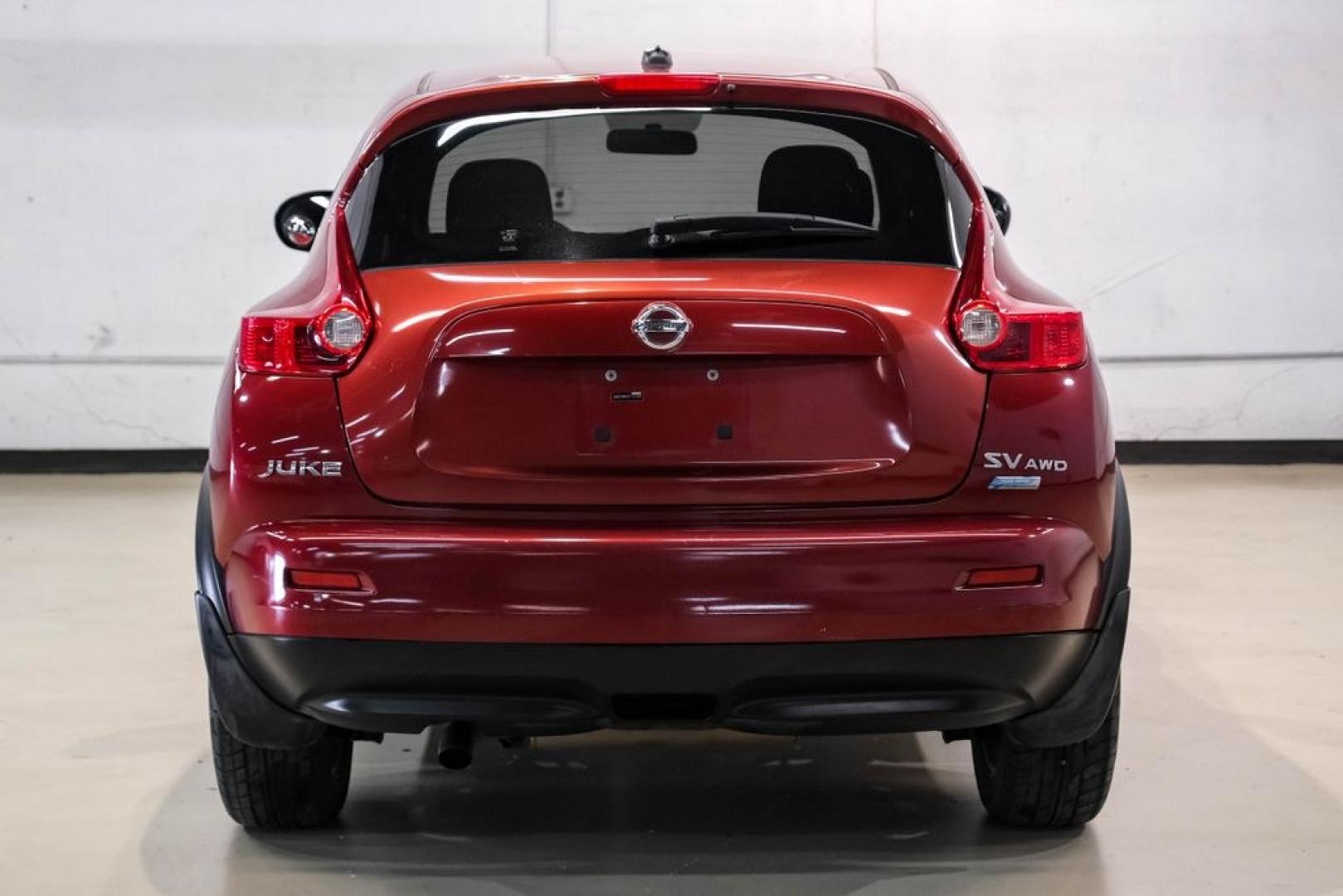 2012 Cayenne Red /Black/Red Nissan Juke SV (JN8AF5MV2CT) with an 1.6L I4 DOHC 16V engine, CVT transmission, located at 15300 Midway Rd., Addison, TX, 75001, (972) 702-0011, 32.958321, -96.838074 - Photo#9