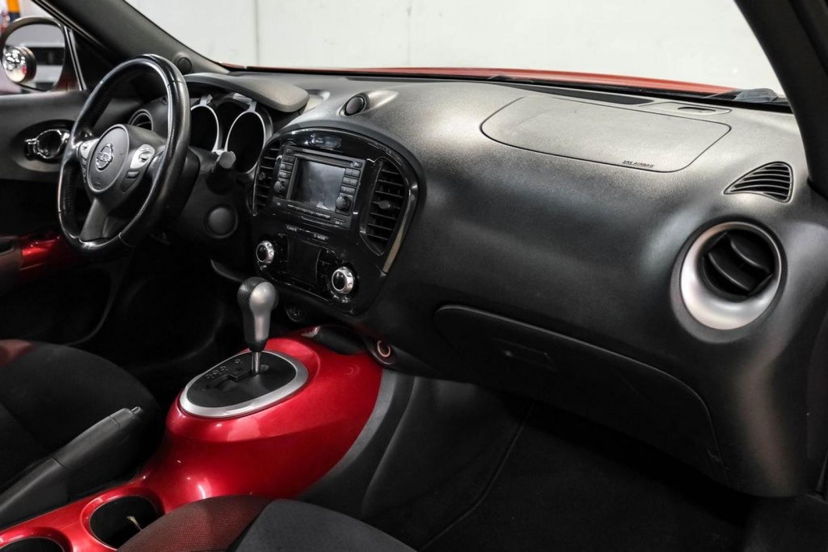2012 Cayenne Red /Black/Red Nissan Juke SV (JN8AF5MV2CT) with an 1.6L I4 DOHC 16V engine, CVT transmission, located at 15300 Midway Rd., Addison, TX, 75001, (972) 702-0011, 32.958321, -96.838074 - Photo#14