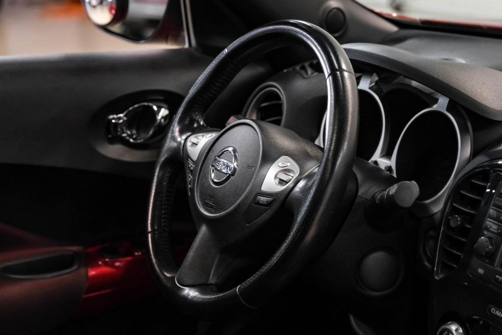 2012 Cayenne Red /Black/Red Nissan Juke SV (JN8AF5MV2CT) with an 1.6L I4 DOHC 16V engine, CVT transmission, located at 15300 Midway Rd., Addison, TX, 75001, (972) 702-0011, 32.958321, -96.838074 - Photo#16