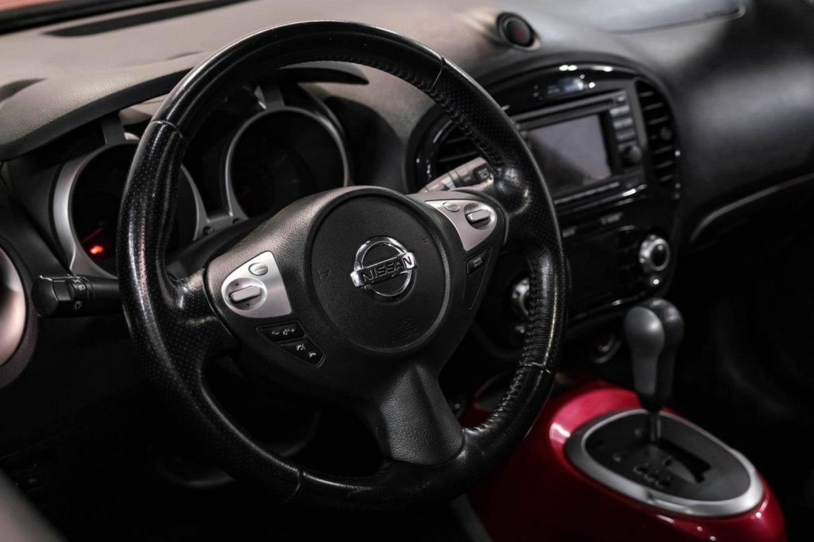 2012 Cayenne Red /Black/Red Nissan Juke SV (JN8AF5MV2CT) with an 1.6L I4 DOHC 16V engine, CVT transmission, located at 15300 Midway Rd., Addison, TX, 75001, (972) 702-0011, 32.958321, -96.838074 - Photo#18