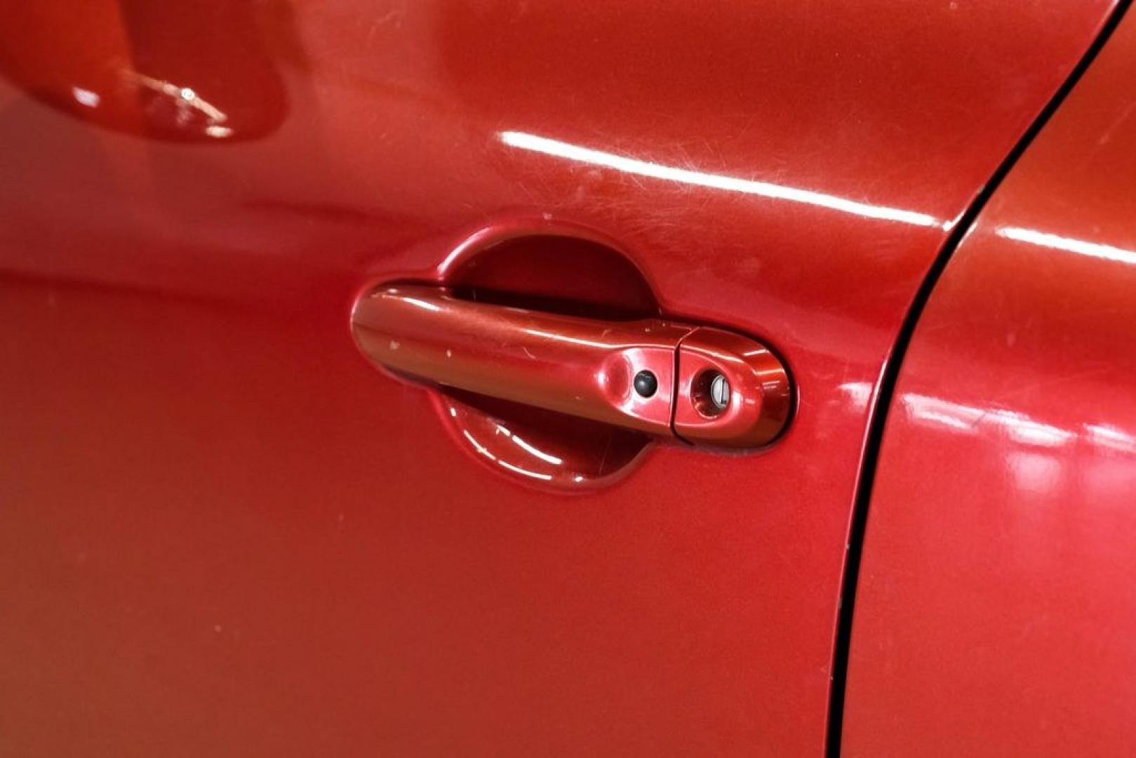 2012 Cayenne Red /Black/Red Nissan Juke SV (JN8AF5MV2CT) with an 1.6L I4 DOHC 16V engine, CVT transmission, located at 15300 Midway Rd., Addison, TX, 75001, (972) 702-0011, 32.958321, -96.838074 - Photo#39