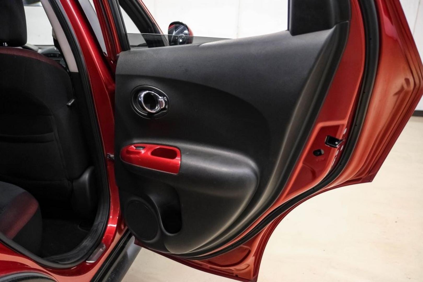 2012 Cayenne Red /Black/Red Nissan Juke SV (JN8AF5MV2CT) with an 1.6L I4 DOHC 16V engine, CVT transmission, located at 15300 Midway Rd., Addison, TX, 75001, (972) 702-0011, 32.958321, -96.838074 - Photo#45