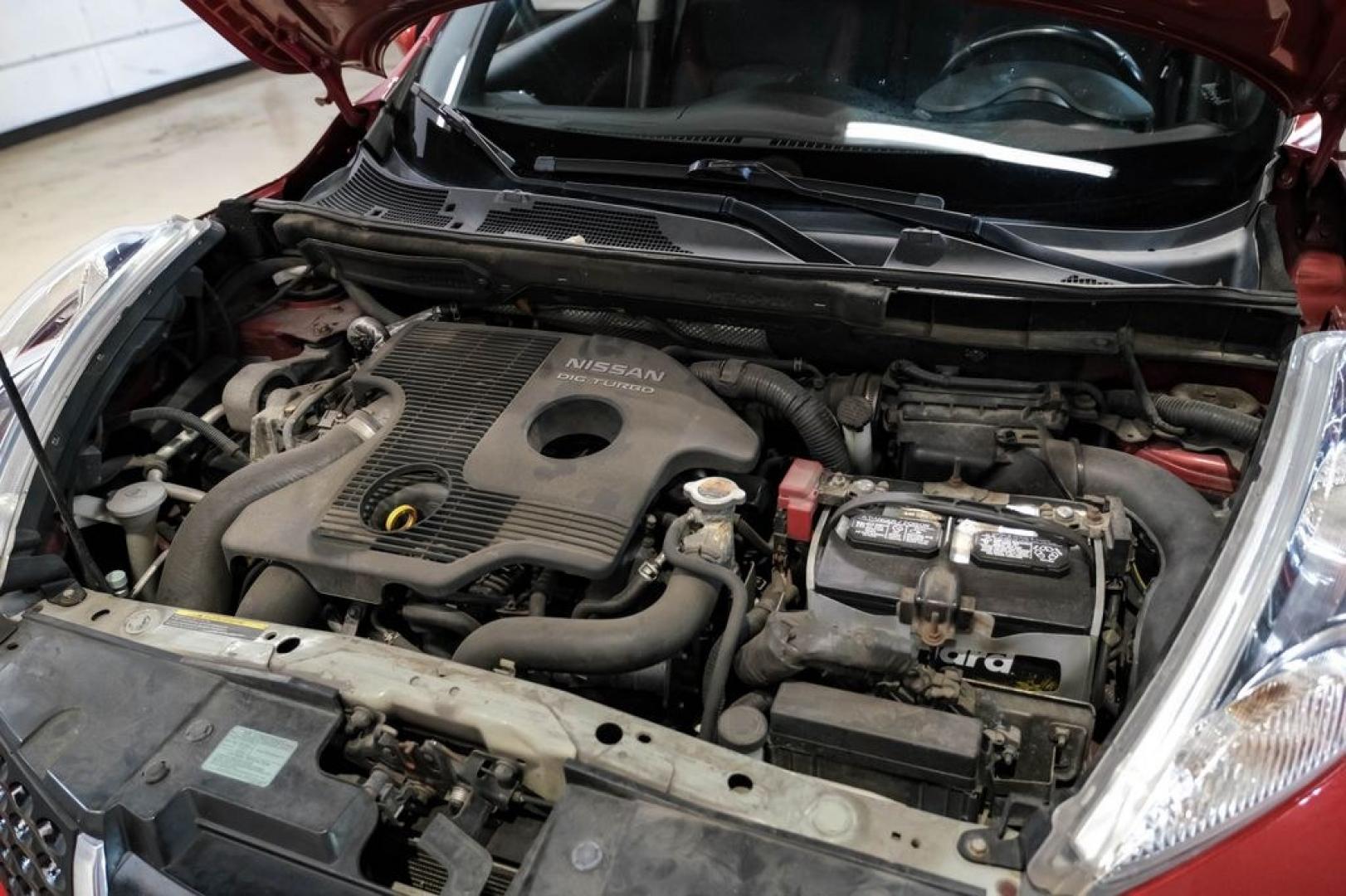 2012 Cayenne Red /Black/Red Nissan Juke SV (JN8AF5MV2CT) with an 1.6L I4 DOHC 16V engine, CVT transmission, located at 15300 Midway Rd., Addison, TX, 75001, (972) 702-0011, 32.958321, -96.838074 - Photo#48