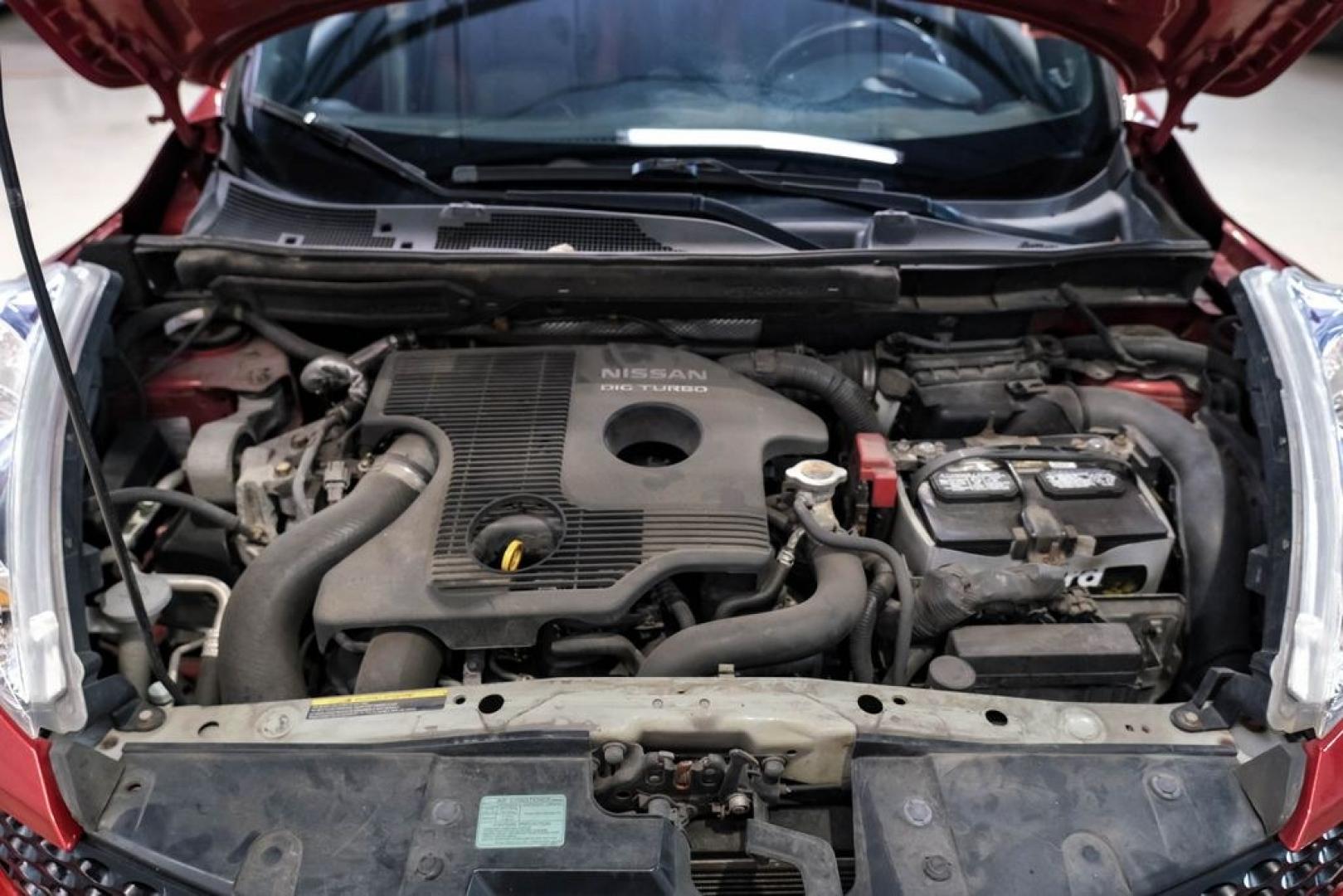 2012 Cayenne Red /Black/Red Nissan Juke SV (JN8AF5MV2CT) with an 1.6L I4 DOHC 16V engine, CVT transmission, located at 15300 Midway Rd., Addison, TX, 75001, (972) 702-0011, 32.958321, -96.838074 - Photo#49