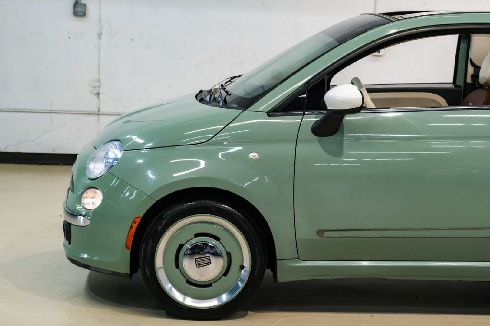 2015 Light Green /Ivory Fiat 500c Lounge (3C3CFFER4FT) with an 1.4L I4 16V MultiAir engine, Automatic transmission, located at 15300 Midway Rd., Addison, TX, 75001, (972) 702-0011, 32.958321, -96.838074 - Photo#11