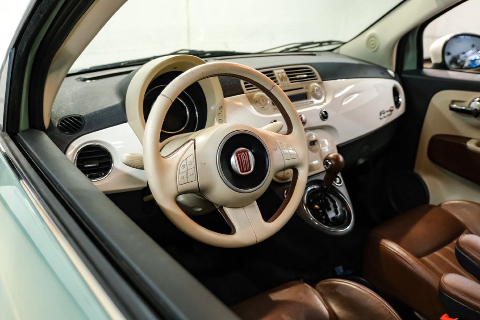 2015 Light Green /Ivory Fiat 500c Lounge (3C3CFFER4FT) with an 1.4L I4 16V MultiAir engine, Automatic transmission, located at 15300 Midway Rd., Addison, TX, 75001, (972) 702-0011, 32.958321, -96.838074 - Photo#15