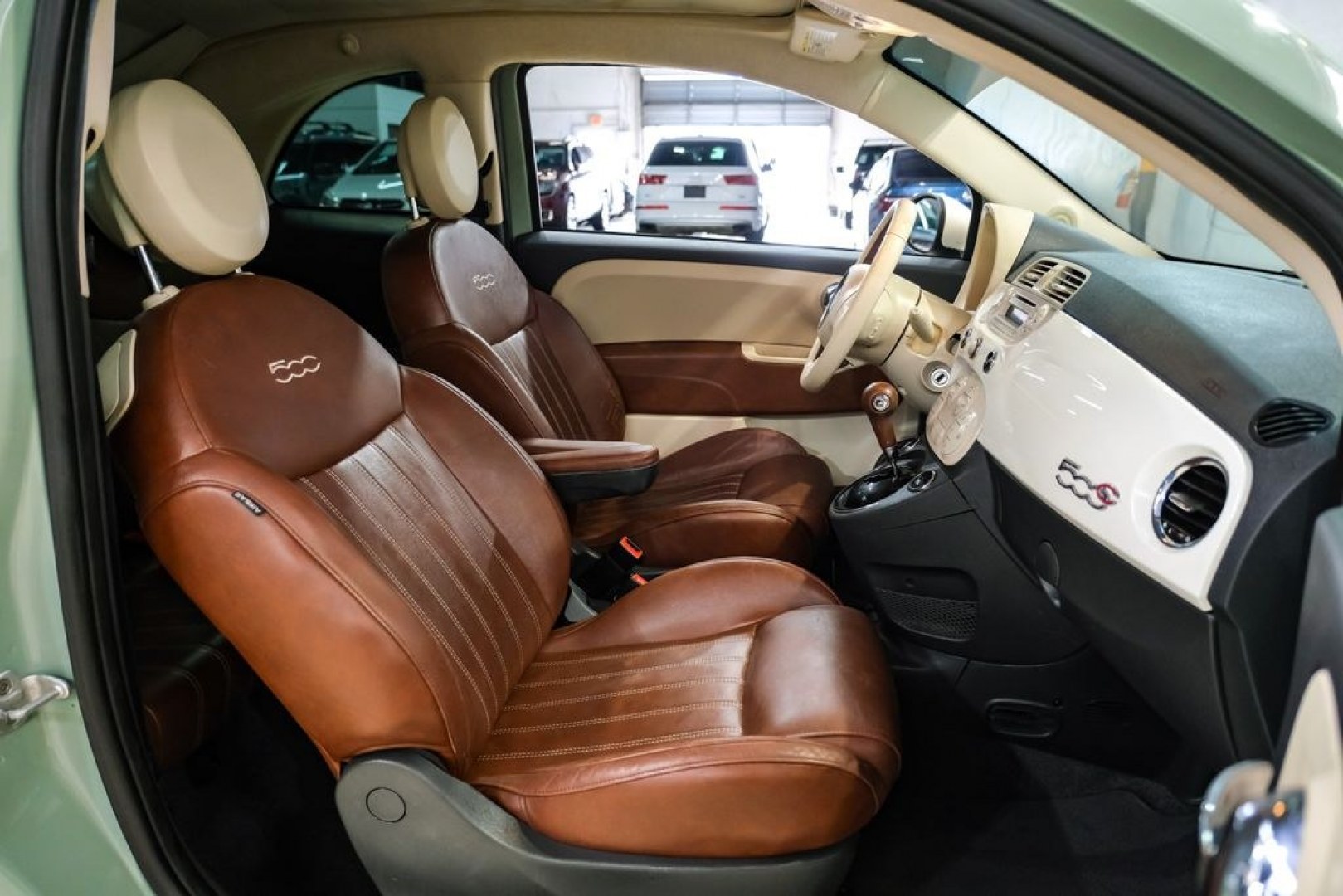 2015 Light Green /Ivory Fiat 500c Lounge (3C3CFFER4FT) with an 1.4L I4 16V MultiAir engine, Automatic transmission, located at 15300 Midway Rd., Addison, TX, 75001, (972) 702-0011, 32.958321, -96.838074 - Photo#31