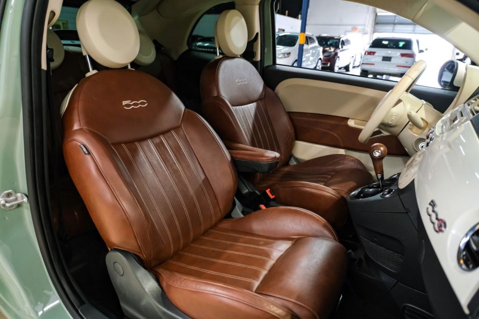 2015 Light Green /Ivory Fiat 500c Lounge (3C3CFFER4FT) with an 1.4L I4 16V MultiAir engine, Automatic transmission, located at 15300 Midway Rd., Addison, TX, 75001, (972) 702-0011, 32.958321, -96.838074 - Photo#32
