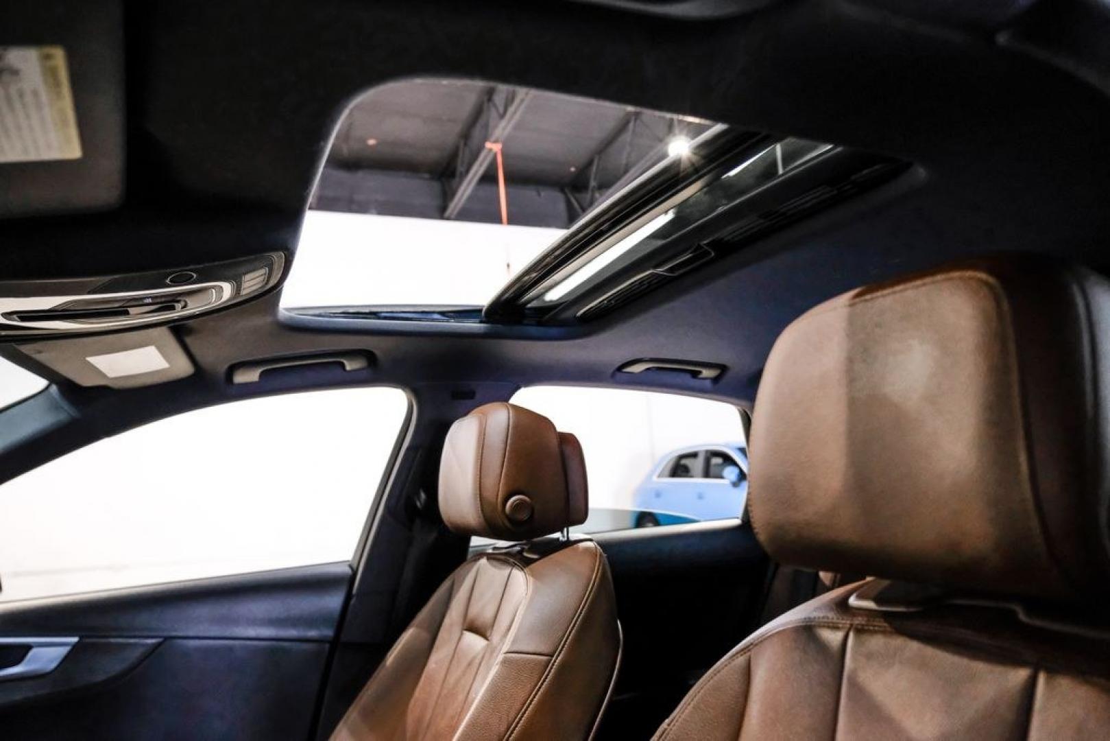 2017 Moonlight Blue /Nougat Brown/Black Audi A4 2.0T Season of Audi ultra Premium (WAUKMAF45HN) with an 2.0L I4 TFSI DOHC engine, Automatic transmission, located at 15300 Midway Rd., Addison, TX, 75001, (972) 702-0011, 32.958321, -96.838074 - Photo#4