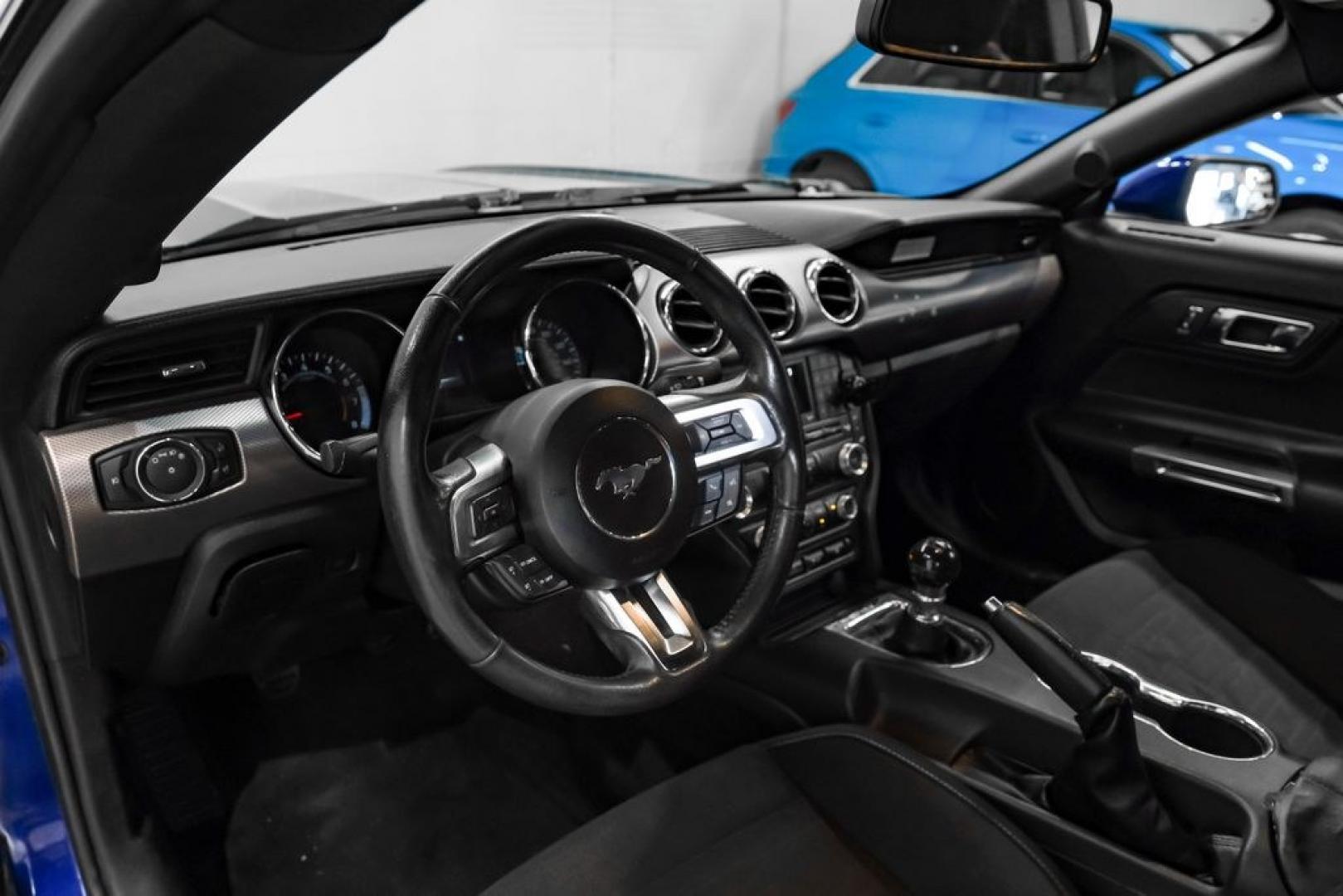 2016 Blue Metallic /Ebony Ford Mustang EcoBoost (1FA6P8TH7G5) with an EcoBoost 2.3L I4 GTDi DOHC Turbocharged VCT engine, Manual transmission, located at 15300 Midway Rd., Addison, TX, 75001, (972) 702-0011, 32.958321, -96.838074 - Photo#2
