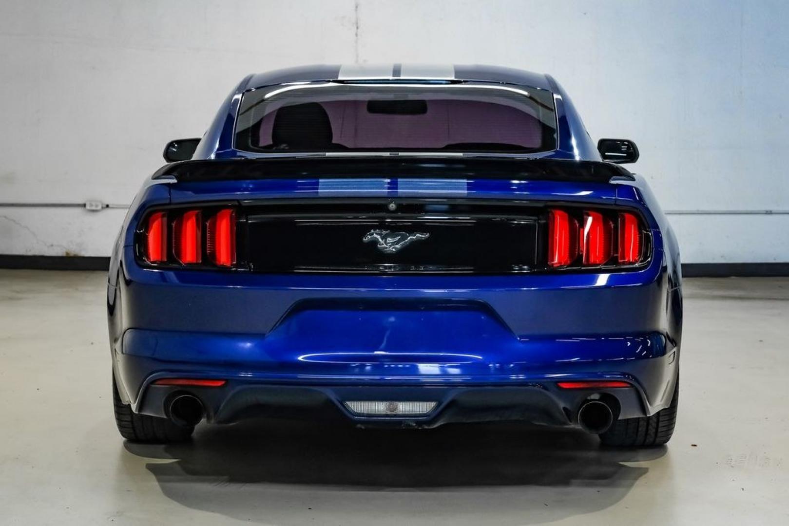 2016 Blue Metallic /Ebony Ford Mustang EcoBoost (1FA6P8TH7G5) with an EcoBoost 2.3L I4 GTDi DOHC Turbocharged VCT engine, Manual transmission, located at 15300 Midway Rd., Addison, TX, 75001, (972) 702-0011, 32.958321, -96.838074 - Photo#10