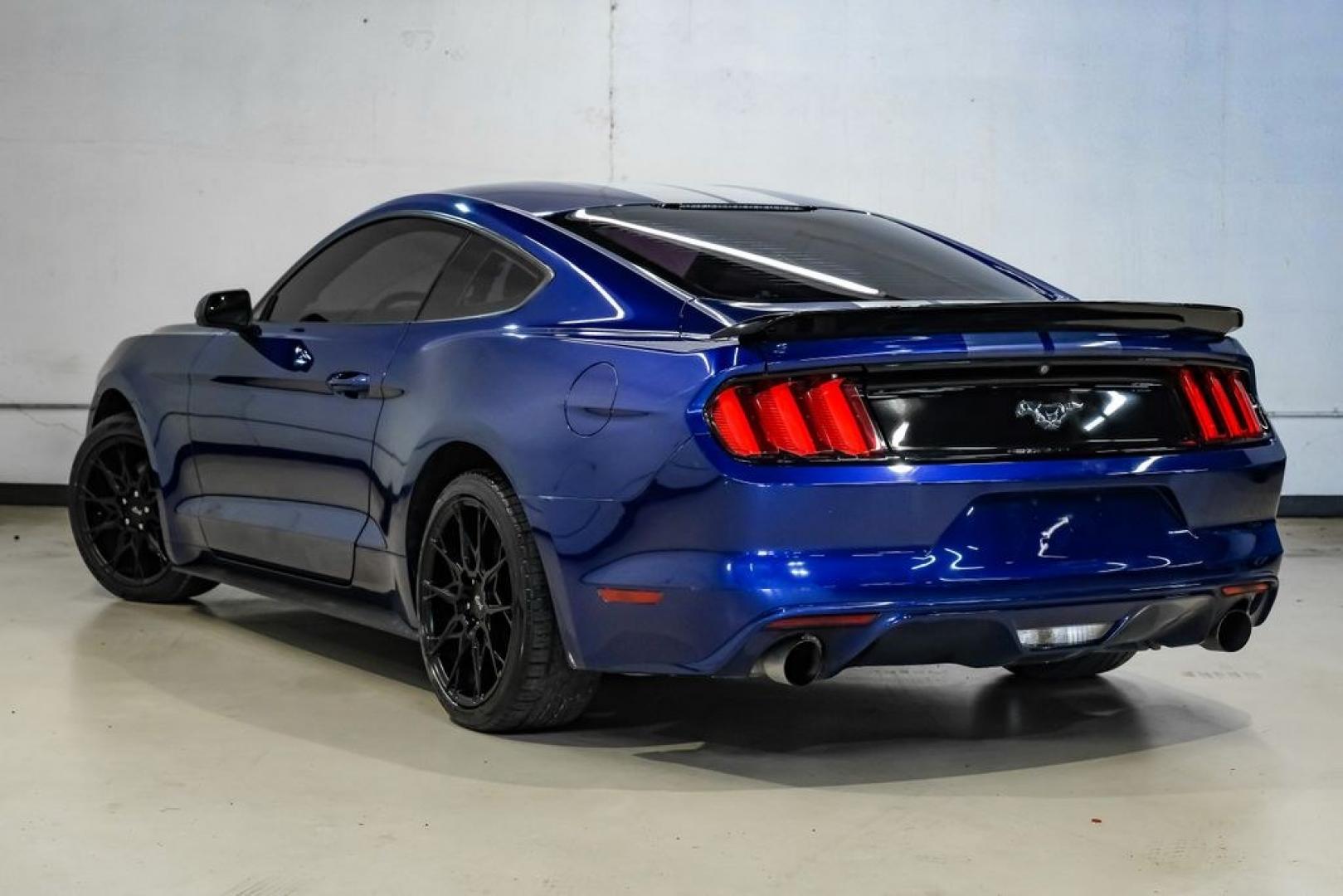 2016 Blue Metallic /Ebony Ford Mustang EcoBoost (1FA6P8TH7G5) with an EcoBoost 2.3L I4 GTDi DOHC Turbocharged VCT engine, Manual transmission, located at 15300 Midway Rd., Addison, TX, 75001, (972) 702-0011, 32.958321, -96.838074 - Photo#11