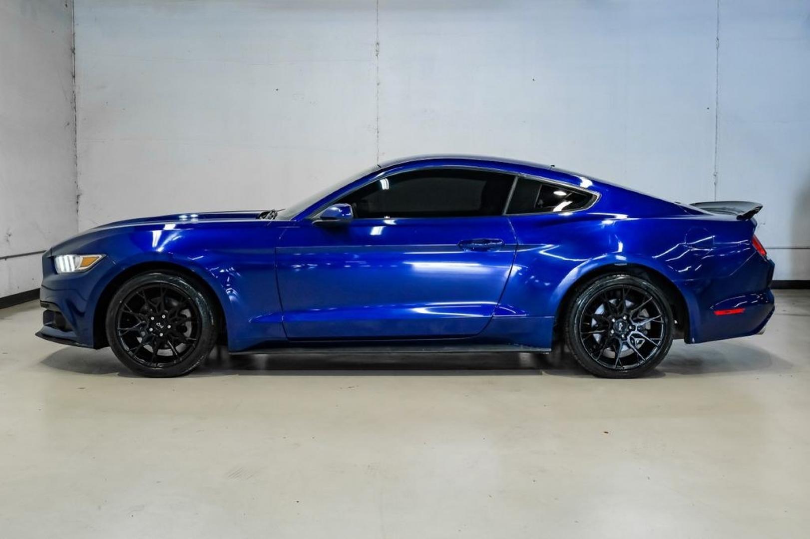 2016 Blue Metallic /Ebony Ford Mustang EcoBoost (1FA6P8TH7G5) with an EcoBoost 2.3L I4 GTDi DOHC Turbocharged VCT engine, Manual transmission, located at 15300 Midway Rd., Addison, TX, 75001, (972) 702-0011, 32.958321, -96.838074 - Photo#14