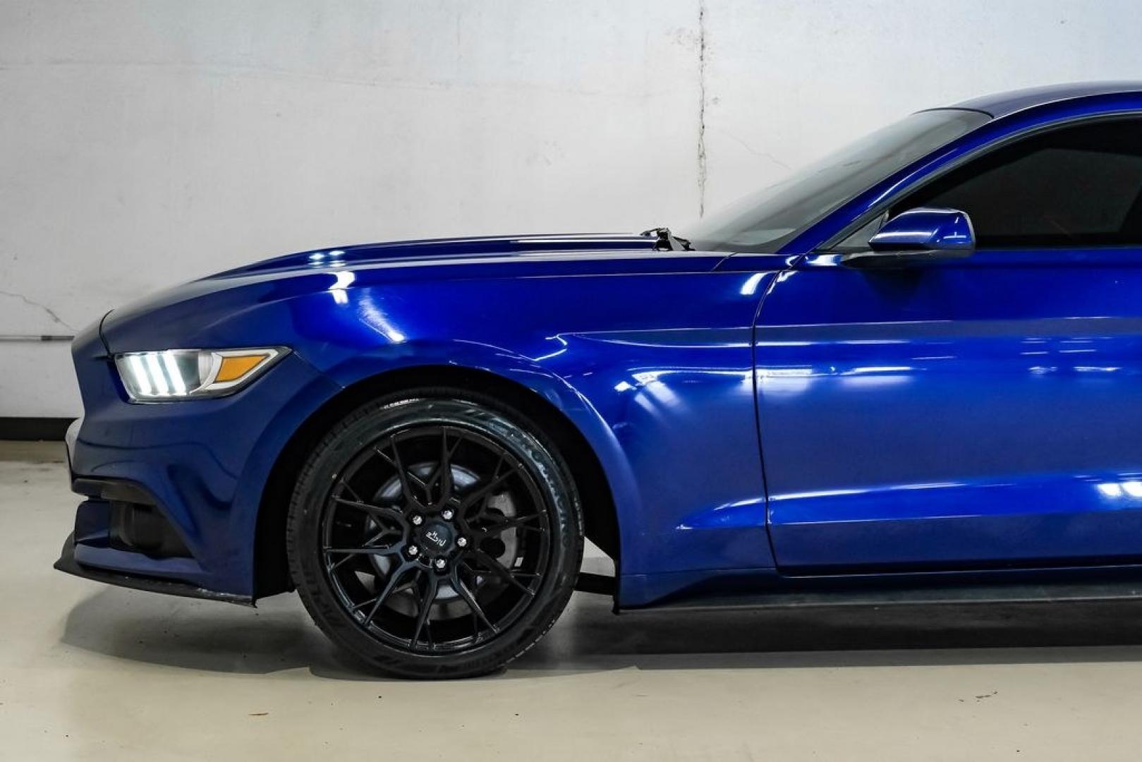 2016 Blue Metallic /Ebony Ford Mustang EcoBoost (1FA6P8TH7G5) with an EcoBoost 2.3L I4 GTDi DOHC Turbocharged VCT engine, Manual transmission, located at 15300 Midway Rd., Addison, TX, 75001, (972) 702-0011, 32.958321, -96.838074 - Photo#15