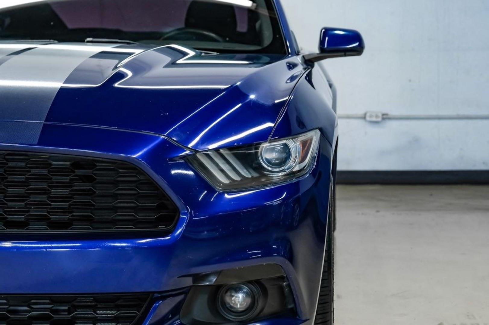 2016 Blue Metallic /Ebony Ford Mustang EcoBoost (1FA6P8TH7G5) with an EcoBoost 2.3L I4 GTDi DOHC Turbocharged VCT engine, Manual transmission, located at 15300 Midway Rd., Addison, TX, 75001, (972) 702-0011, 32.958321, -96.838074 - Photo#40