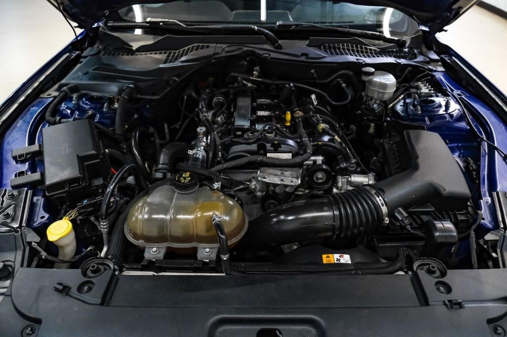 2016 Blue Metallic /Ebony Ford Mustang EcoBoost (1FA6P8TH7G5) with an EcoBoost 2.3L I4 GTDi DOHC Turbocharged VCT engine, Manual transmission, located at 15300 Midway Rd., Addison, TX, 75001, (972) 702-0011, 32.958321, -96.838074 - Photo#43