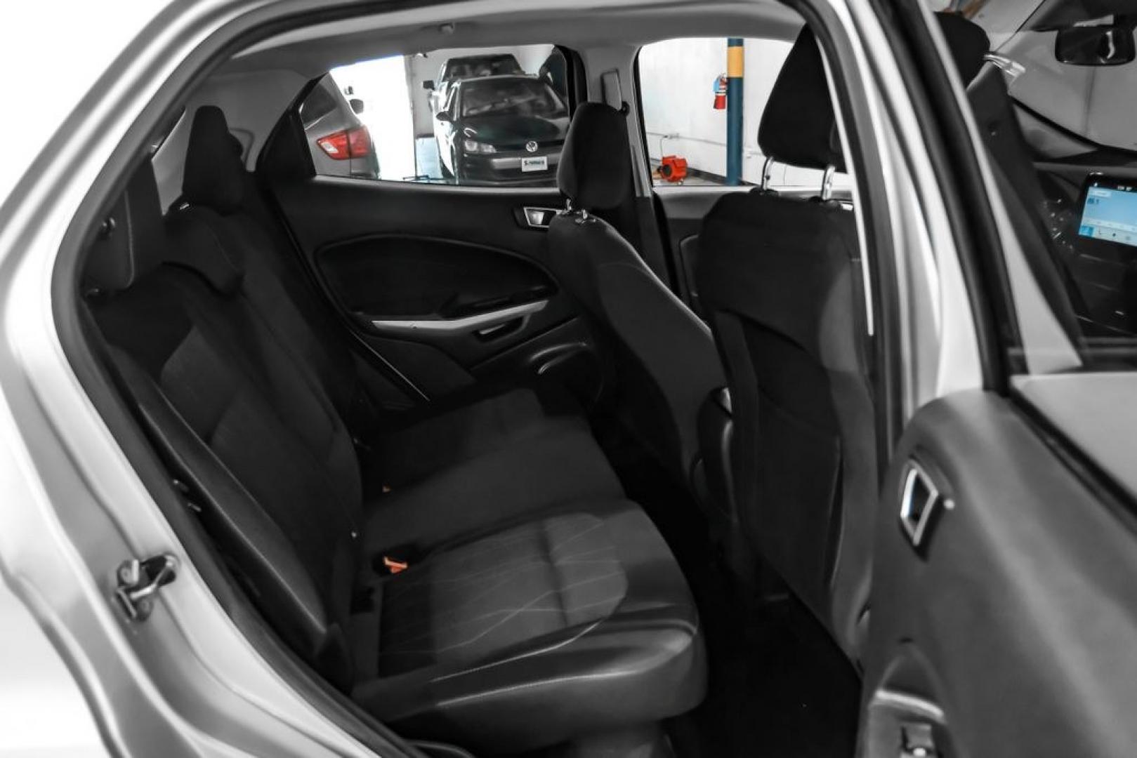 2018 Silver Metallic /Black Ford EcoSport SE (MAJ3P1TE9JC) with an EcoBoost 1.0L I3 GTDi DOHC Turbocharged VCT engine, Automatic transmission, located at 15300 Midway Rd., Addison, TX, 75001, (972) 702-0011, 32.958321, -96.838074- Photo#37