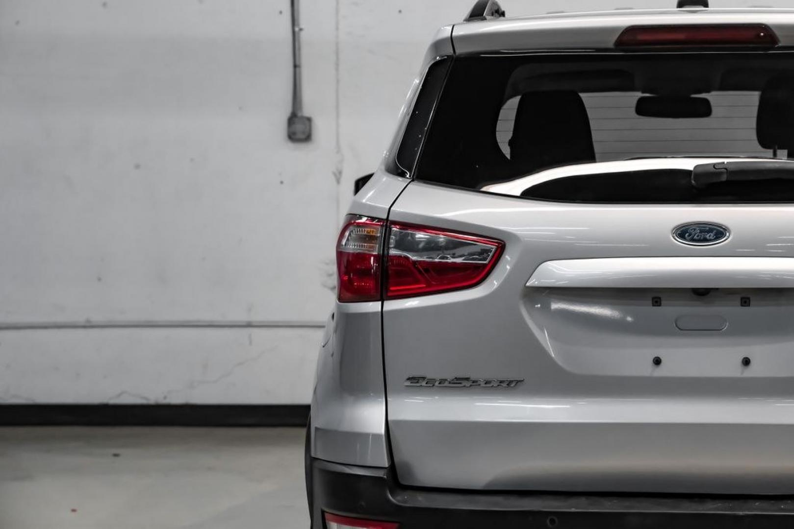 2018 Silver Metallic /Black Ford EcoSport SE (MAJ3P1TE9JC) with an EcoBoost 1.0L I3 GTDi DOHC Turbocharged VCT engine, Automatic transmission, located at 15300 Midway Rd., Addison, TX, 75001, (972) 702-0011, 32.958321, -96.838074- Photo#48