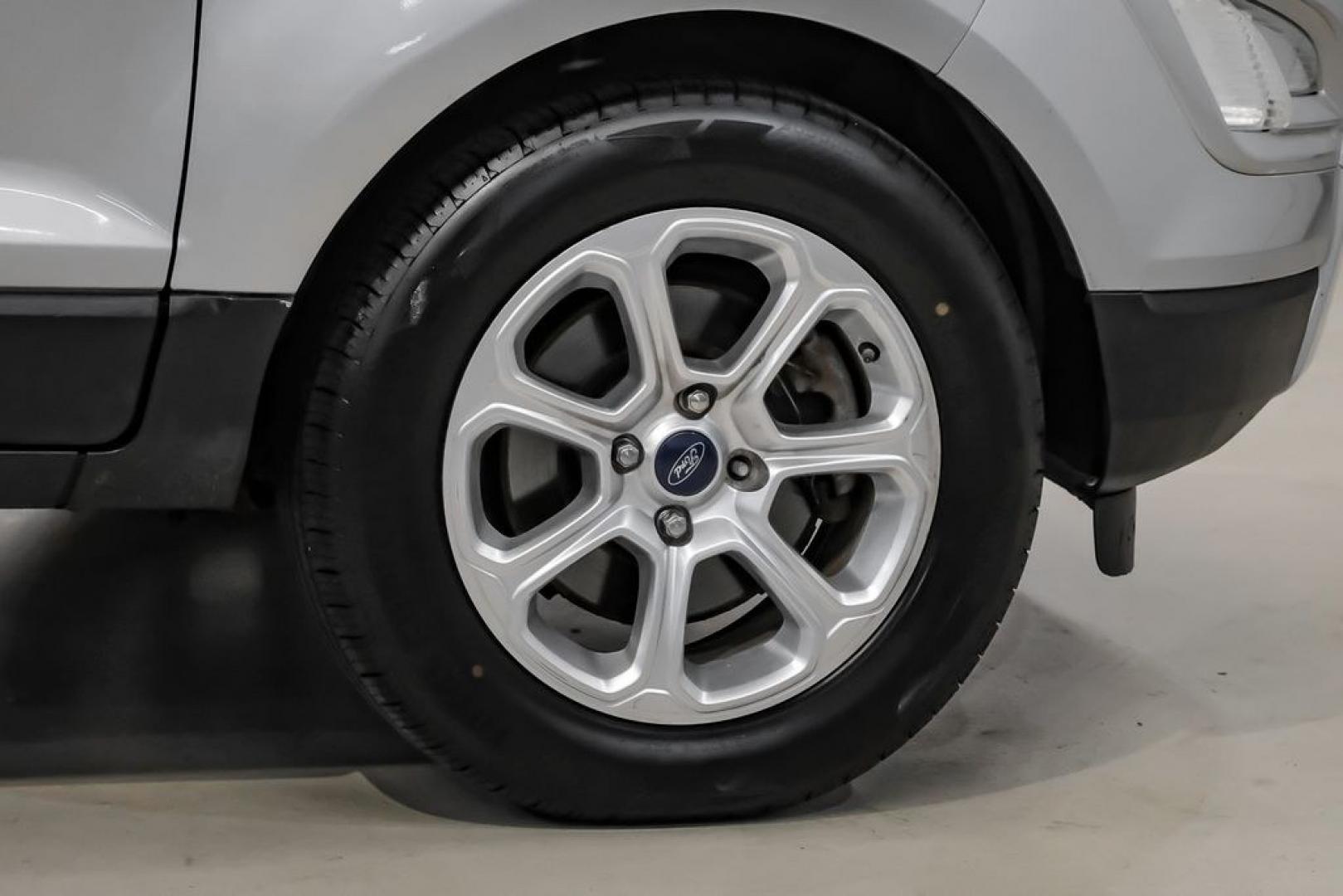 2018 Silver Metallic /Black Ford EcoSport SE (MAJ3P1TE9JC) with an EcoBoost 1.0L I3 GTDi DOHC Turbocharged VCT engine, Automatic transmission, located at 15300 Midway Rd., Addison, TX, 75001, (972) 702-0011, 32.958321, -96.838074- Photo#53