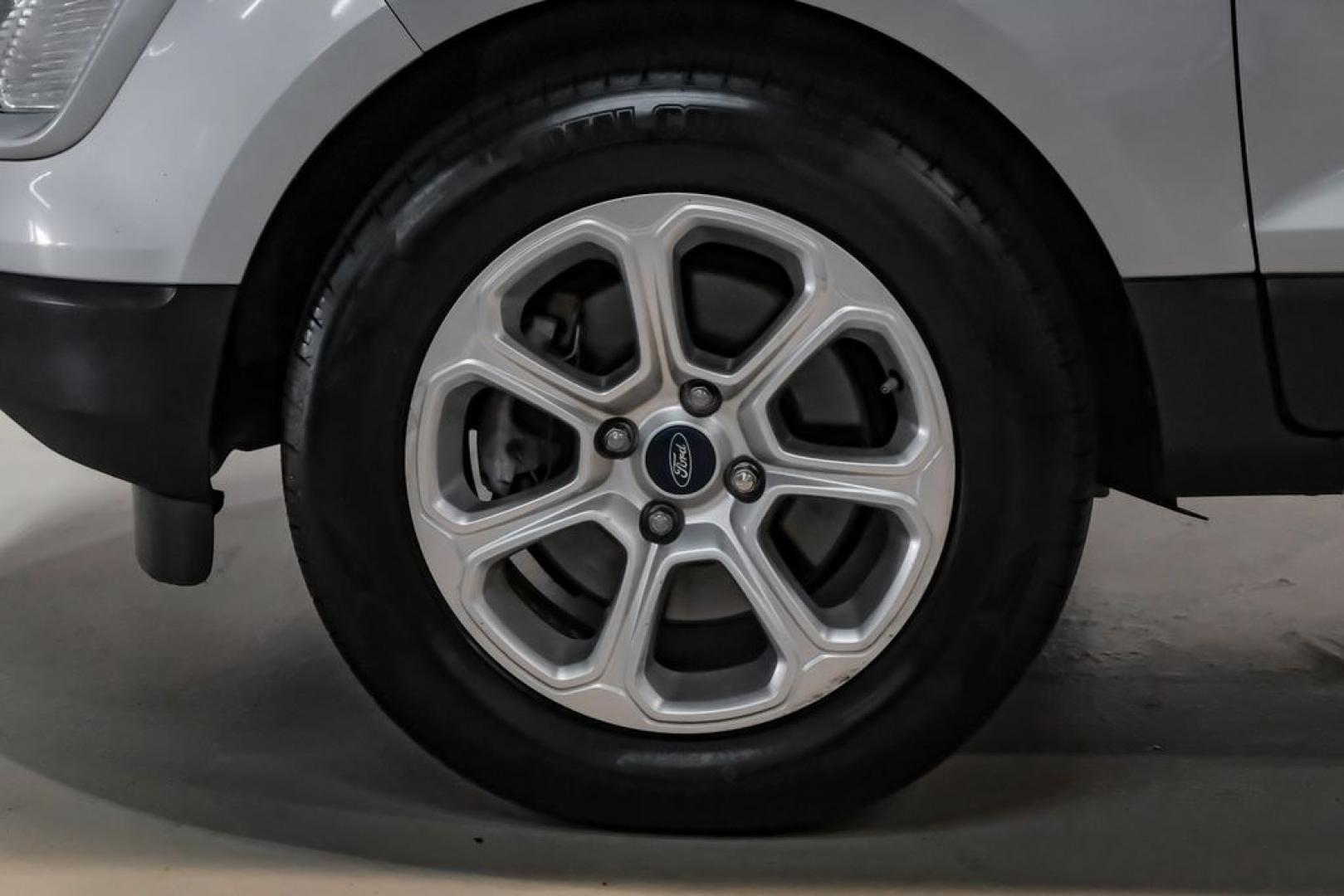 2018 Silver Metallic /Black Ford EcoSport SE (MAJ3P1TE9JC) with an EcoBoost 1.0L I3 GTDi DOHC Turbocharged VCT engine, Automatic transmission, located at 15300 Midway Rd., Addison, TX, 75001, (972) 702-0011, 32.958321, -96.838074- Photo#54