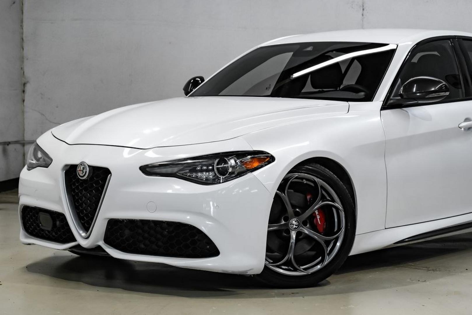 2019 White /Black Alfa Romeo Giulia Ti Sport Carbon (ZARFAMBN9K7) with an I4 engine, Automatic transmission, located at 15300 Midway Rd., Addison, TX, 75001, (972) 702-0011, 32.958321, -96.838074 - Photo#4