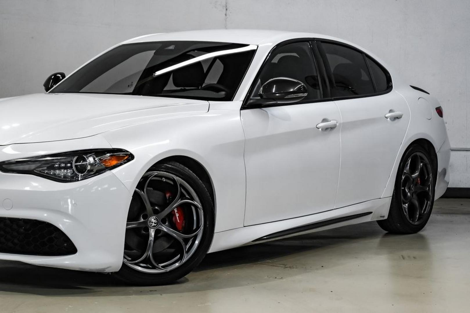 2019 White /Black Alfa Romeo Giulia Ti Sport Carbon (ZARFAMBN9K7) with an I4 engine, Automatic transmission, located at 15300 Midway Rd., Addison, TX, 75001, (972) 702-0011, 32.958321, -96.838074 - Photo#5