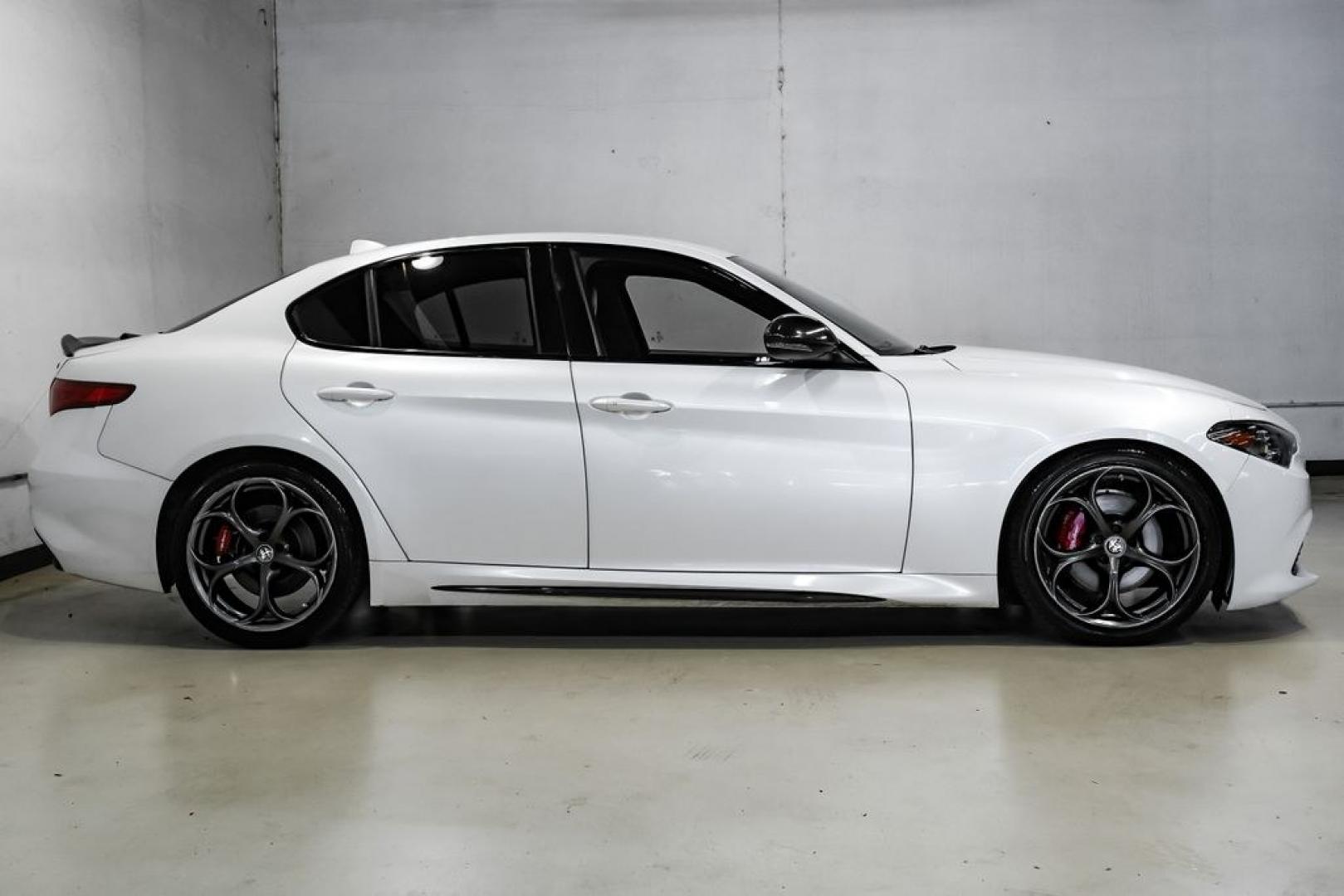 2019 White /Black Alfa Romeo Giulia Ti Sport Carbon (ZARFAMBN9K7) with an I4 engine, Automatic transmission, located at 15300 Midway Rd., Addison, TX, 75001, (972) 702-0011, 32.958321, -96.838074 - Photo#8