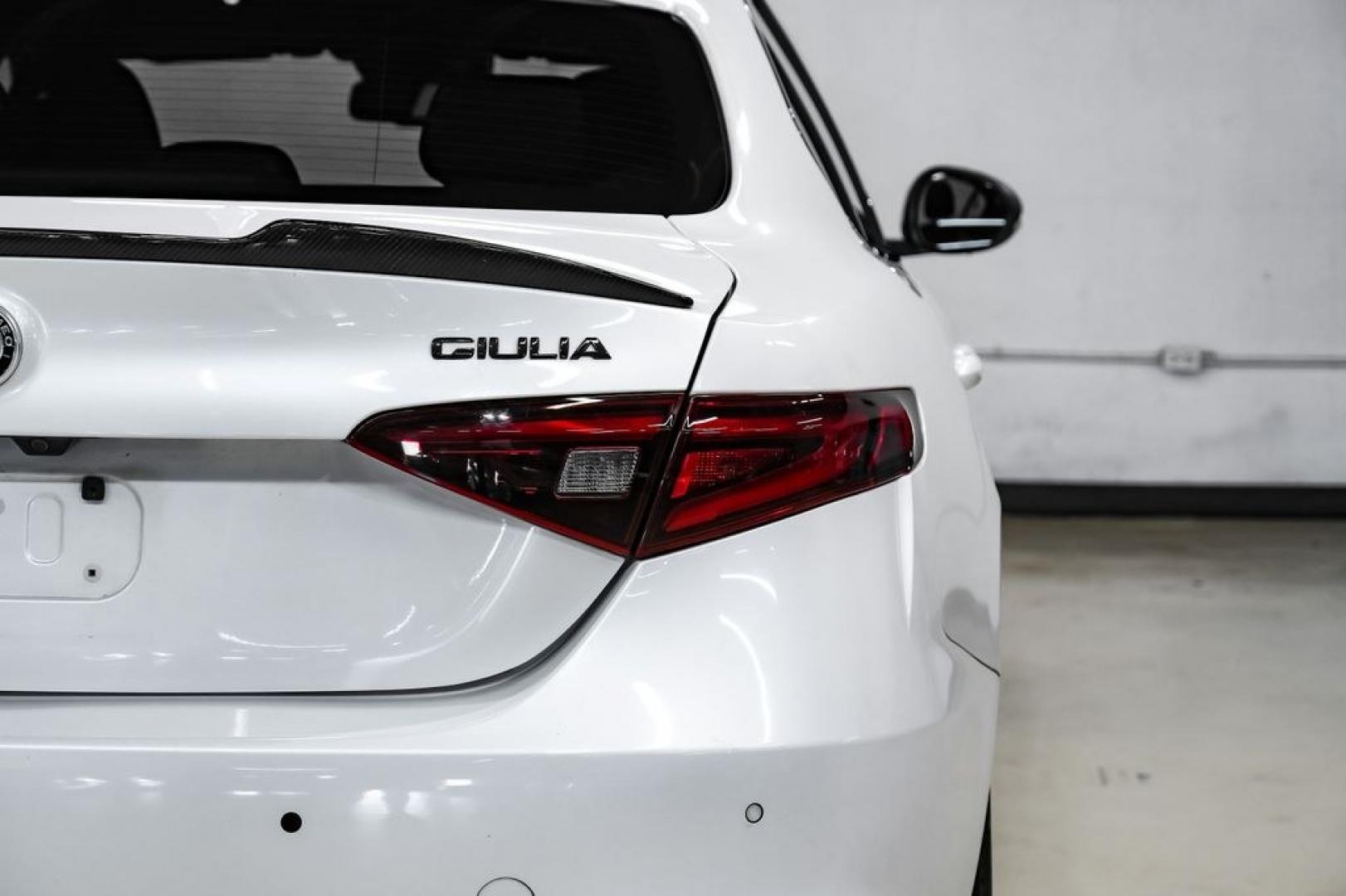 2019 White /Black Alfa Romeo Giulia Ti Sport Carbon (ZARFAMBN9K7) with an I4 engine, Automatic transmission, located at 15300 Midway Rd., Addison, TX, 75001, (972) 702-0011, 32.958321, -96.838074 - Photo#47
