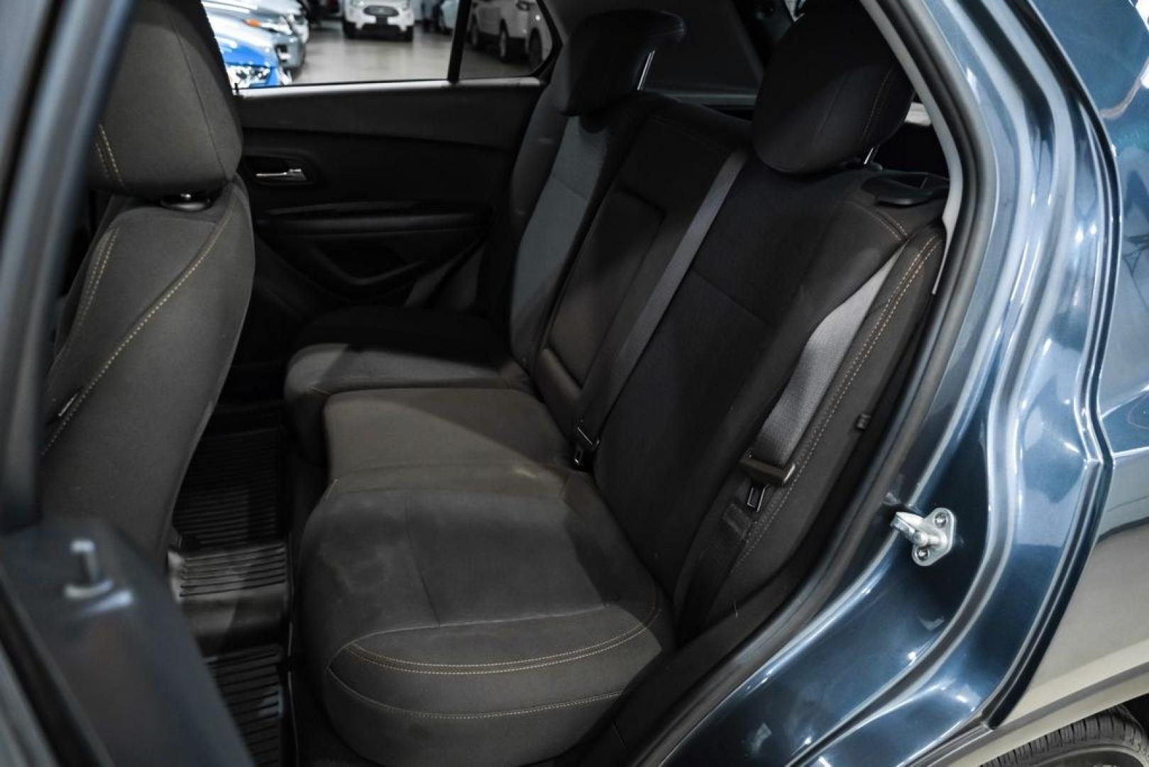 2021 Shadow Gray Metallic /Jet Black Chevrolet Trax LS (KL7CJKSB0MB) with an ECOTEC Turbo 1.4L VVT DOHC 4-Cyl engine, Automatic transmission, located at 15300 Midway Rd., Addison, TX, 75001, (972) 702-0011, 32.958321, -96.838074 - Photo#38