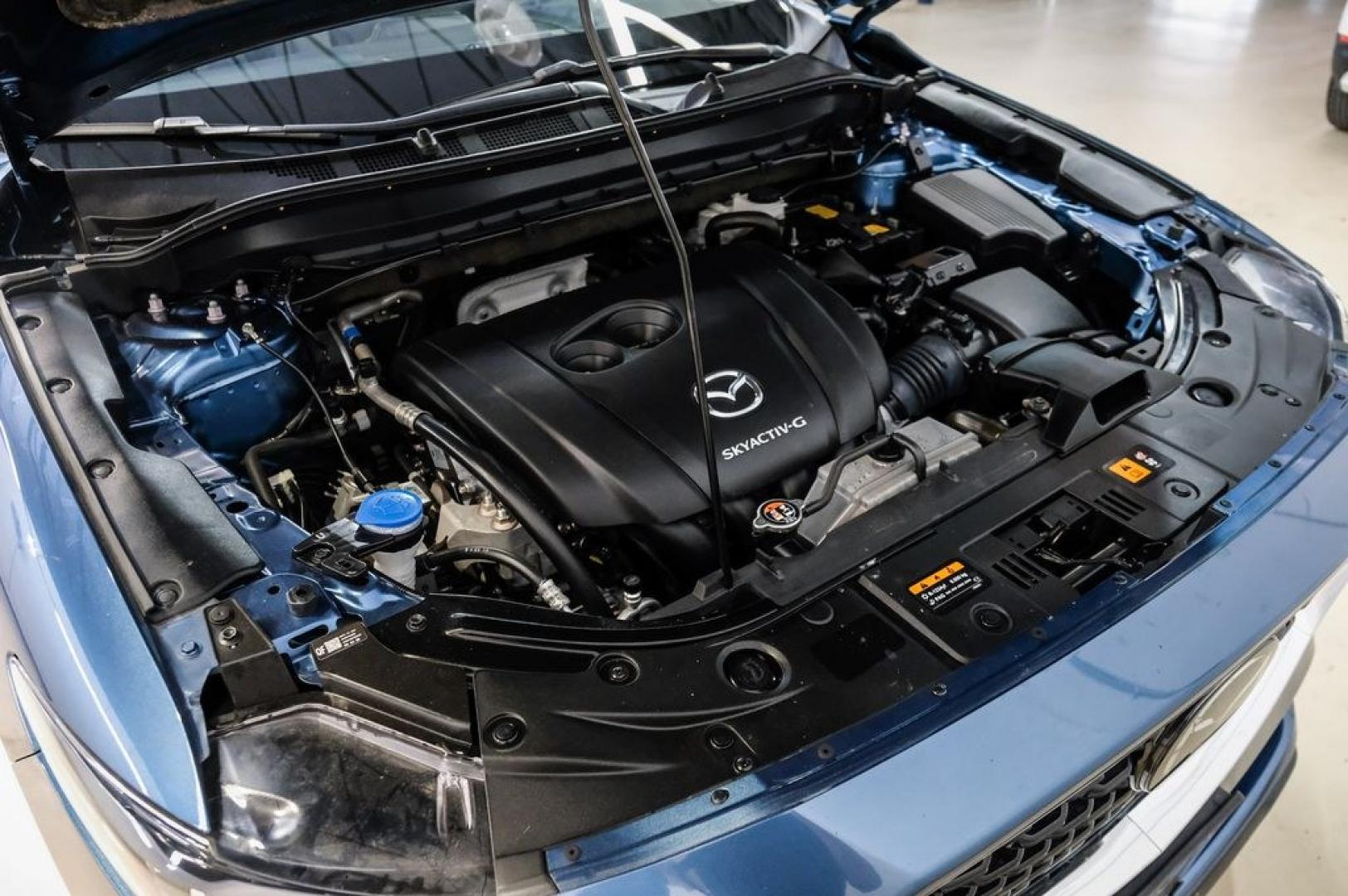2024 Eternal Blue /Black Mazda CX-5 2.5 S Preferred Package (JM3KFBCL6R0) with an SKYACTIV-G 2.5L 4-Cylinder DOHC 16V engine, Automatic transmission, located at 15300 Midway Rd., Addison, TX, 75001, (972) 702-0011, 32.958321, -96.838074 - Photo#63