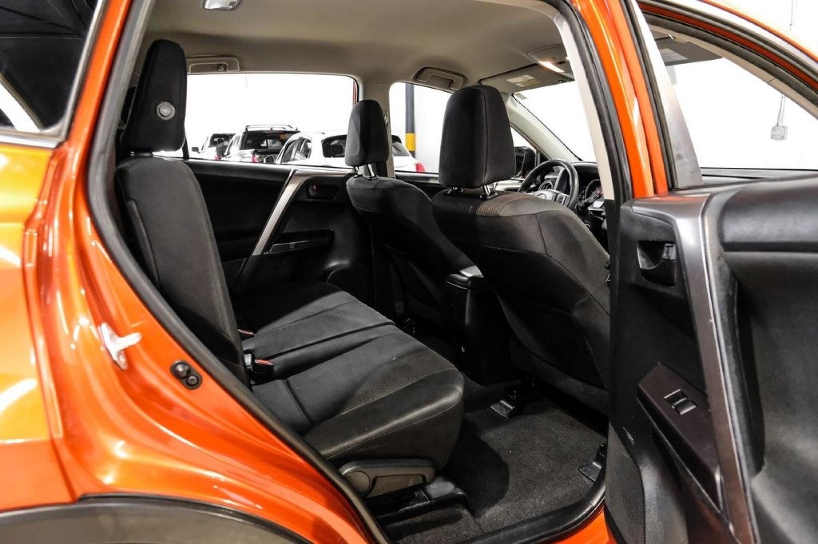 2016 Hot Lava /Black Toyota RAV4 LE (JTMZFREV3GJ) with an 2.5L 4-Cylinder DOHC Dual VVT-i engine, Automatic transmission, located at 15300 Midway Rd., Addison, TX, 75001, (972) 702-0011, 32.958321, -96.838074 - Photo#40