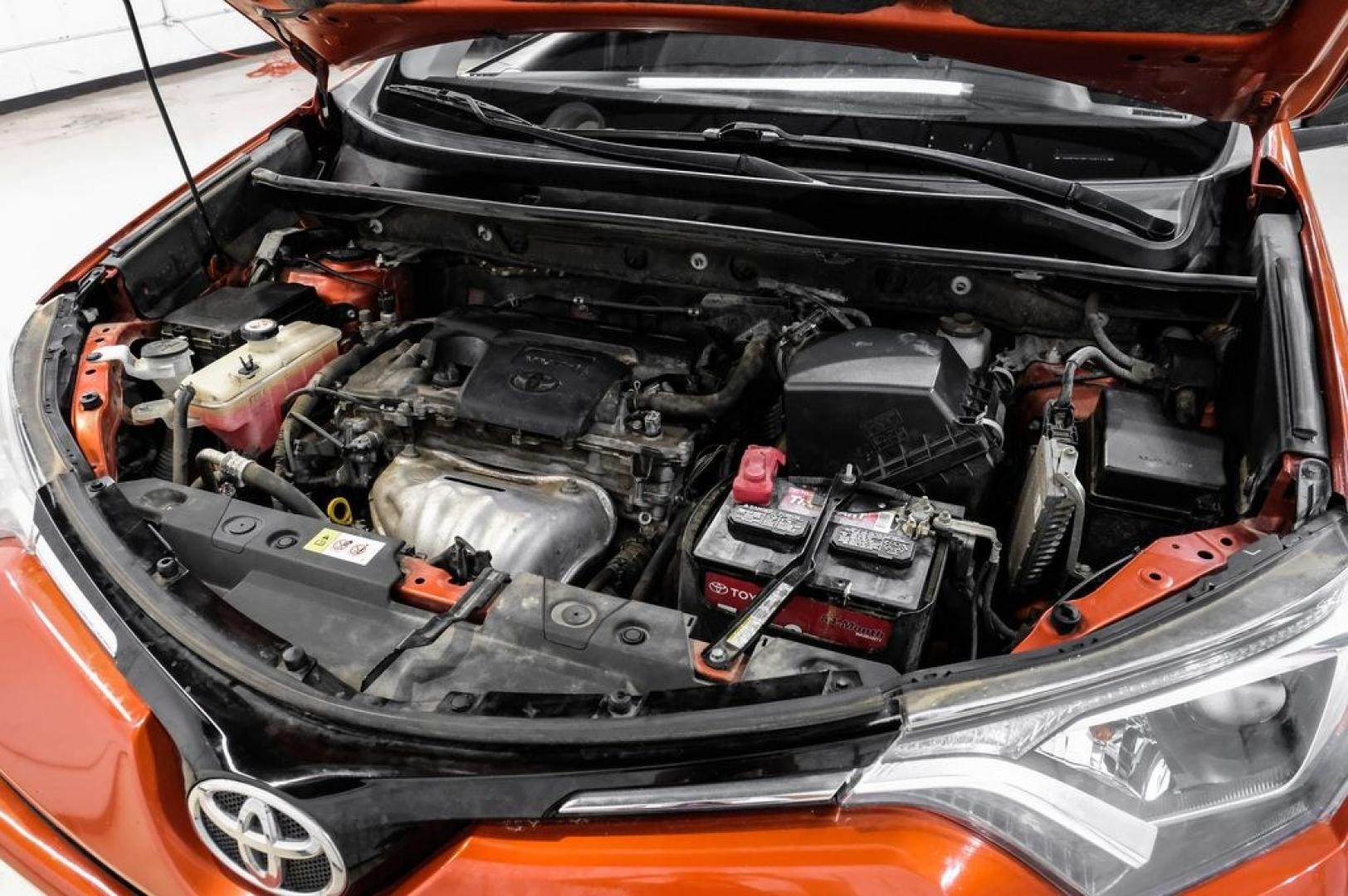 2016 Hot Lava /Black Toyota RAV4 LE (JTMZFREV3GJ) with an 2.5L 4-Cylinder DOHC Dual VVT-i engine, Automatic transmission, located at 15300 Midway Rd., Addison, TX, 75001, (972) 702-0011, 32.958321, -96.838074 - Photo#52