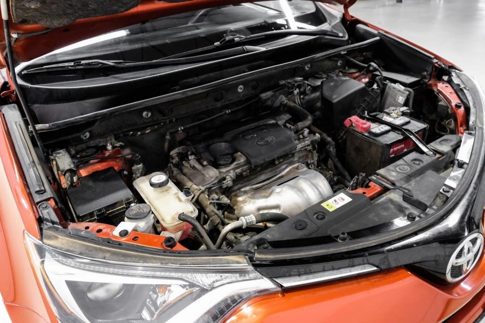 2016 Hot Lava /Black Toyota RAV4 LE (JTMZFREV3GJ) with an 2.5L 4-Cylinder DOHC Dual VVT-i engine, Automatic transmission, located at 15300 Midway Rd., Addison, TX, 75001, (972) 702-0011, 32.958321, -96.838074 - Photo#54